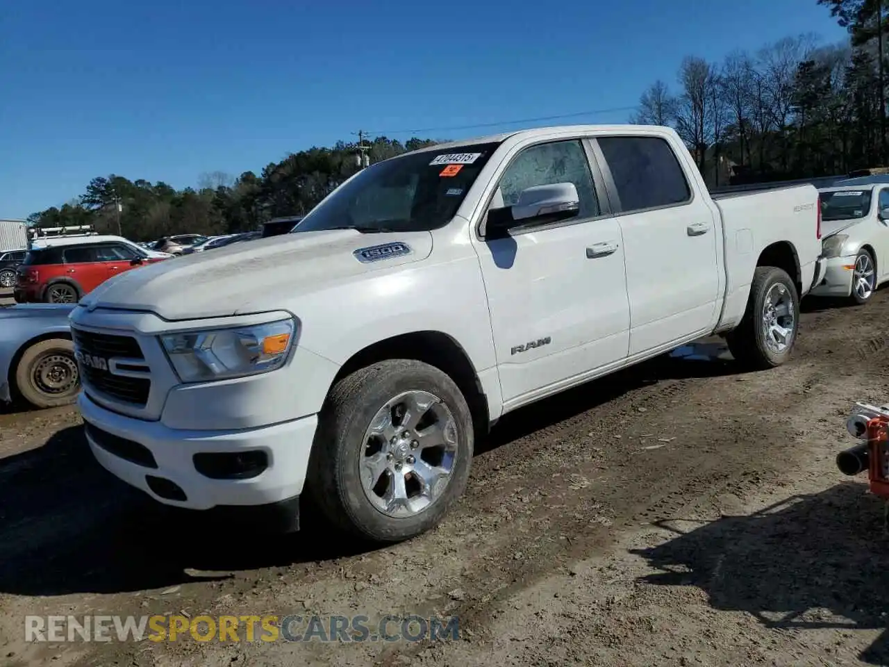 1 Photograph of a damaged car 1C6RREFT8MN501276 RAM 1500 2021