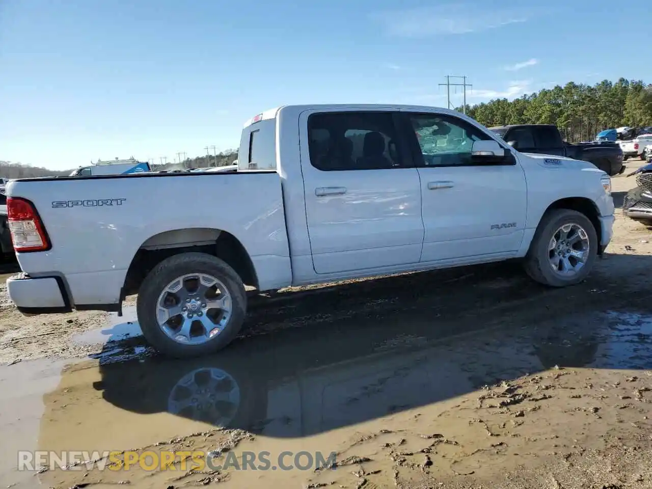 3 Photograph of a damaged car 1C6RREFT8MN501276 RAM 1500 2021