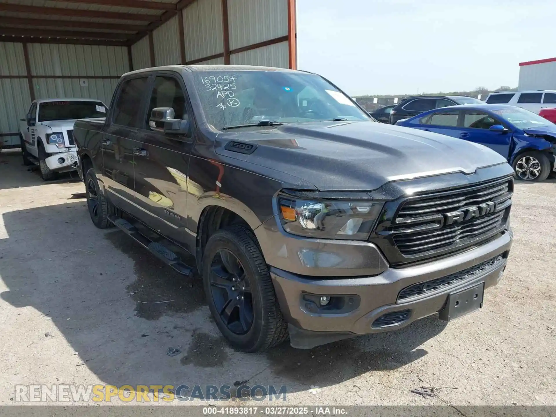 1 Photograph of a damaged car 1C6RREFT8MN584868 RAM 1500 2021
