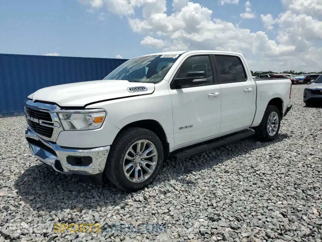 1 Photograph of a damaged car 1C6RREFT8MN743548 RAM 1500 2021