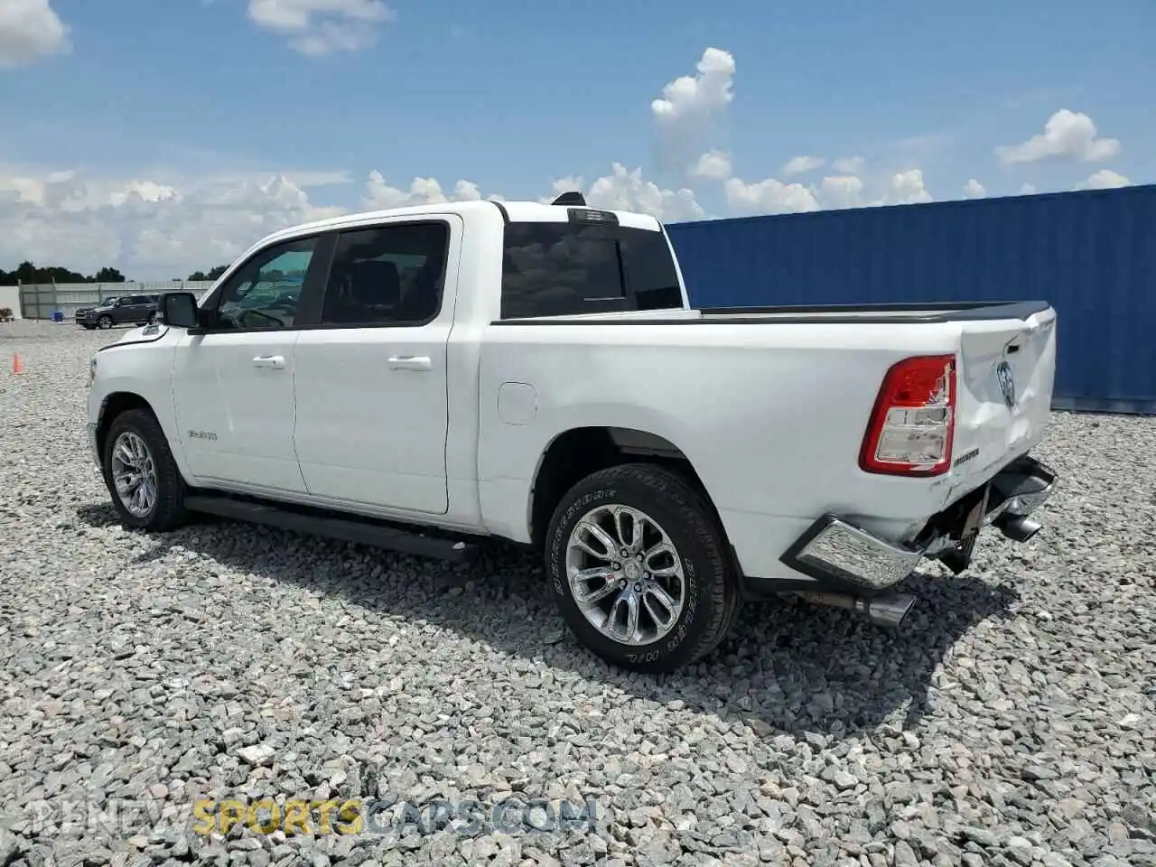 2 Photograph of a damaged car 1C6RREFT8MN743548 RAM 1500 2021