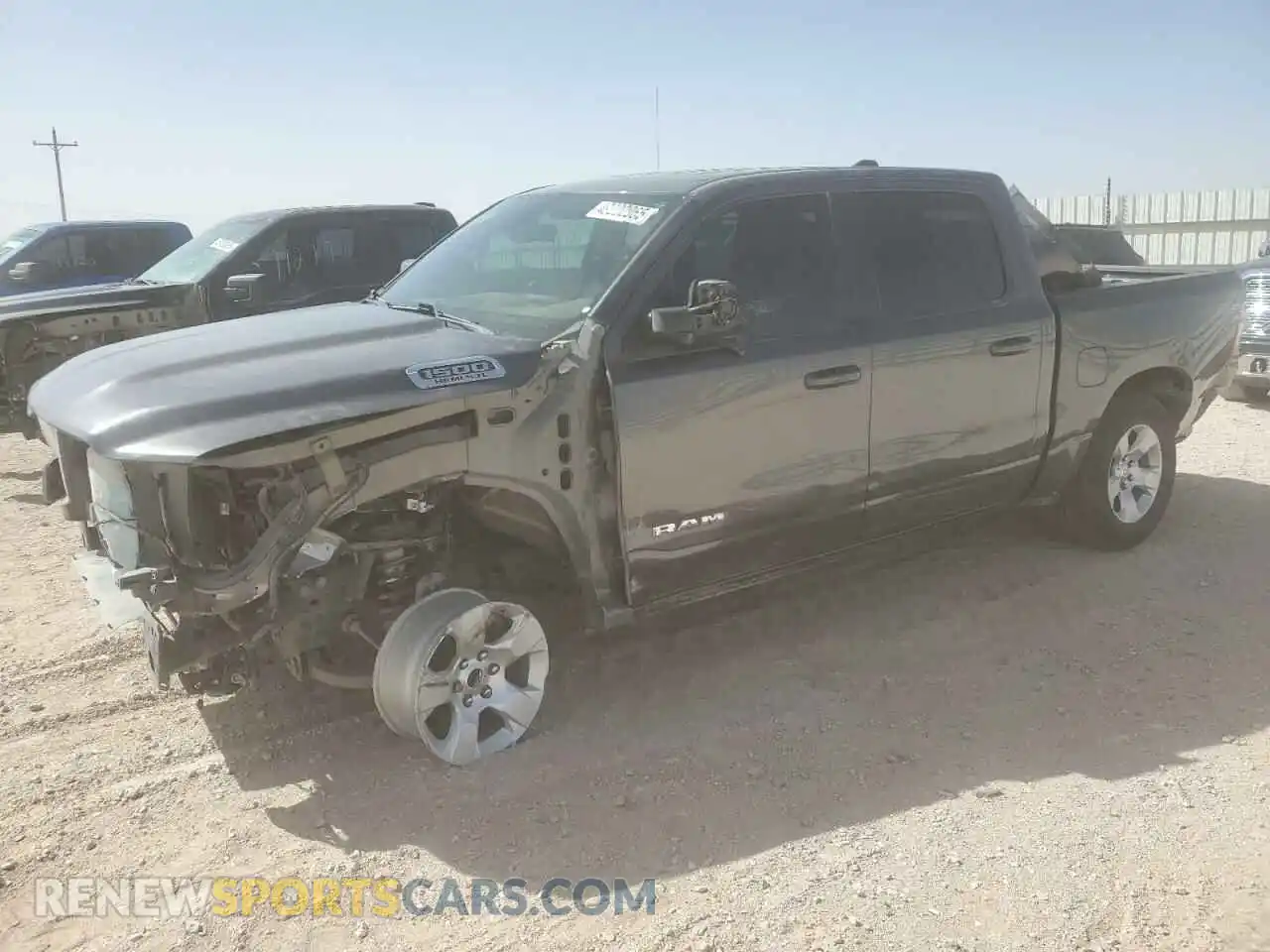 1 Photograph of a damaged car 1C6RREFT9MN543746 RAM 1500 2021