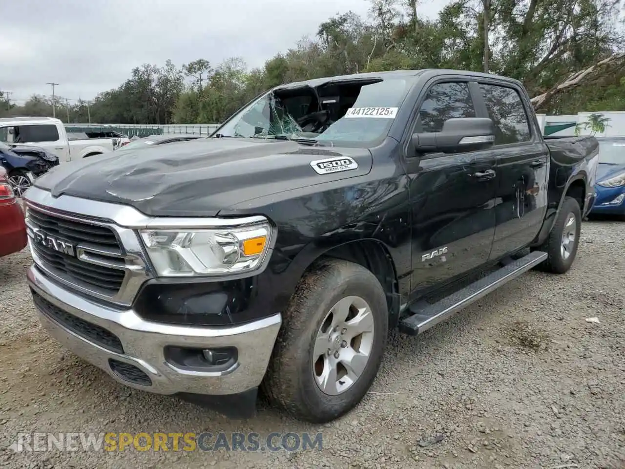 1 Photograph of a damaged car 1C6RREFT9MN574642 RAM 1500 2021