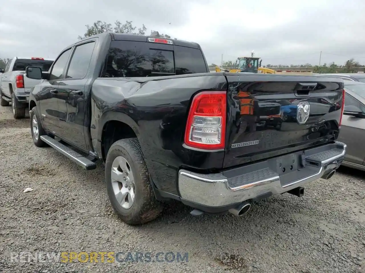 2 Photograph of a damaged car 1C6RREFT9MN574642 RAM 1500 2021