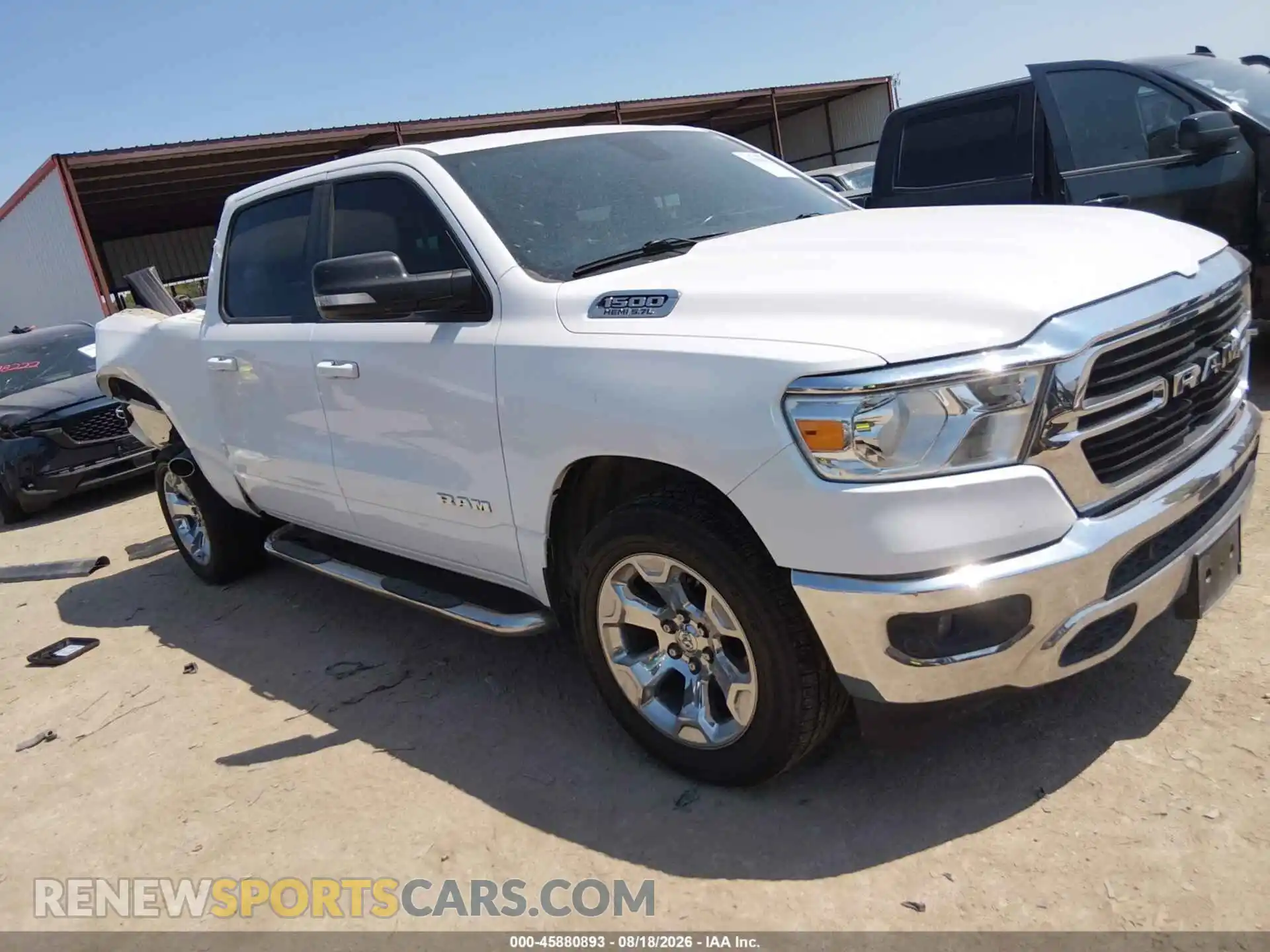 1 Photograph of a damaged car 1C6RREFT9MN584684 RAM 1500 2021