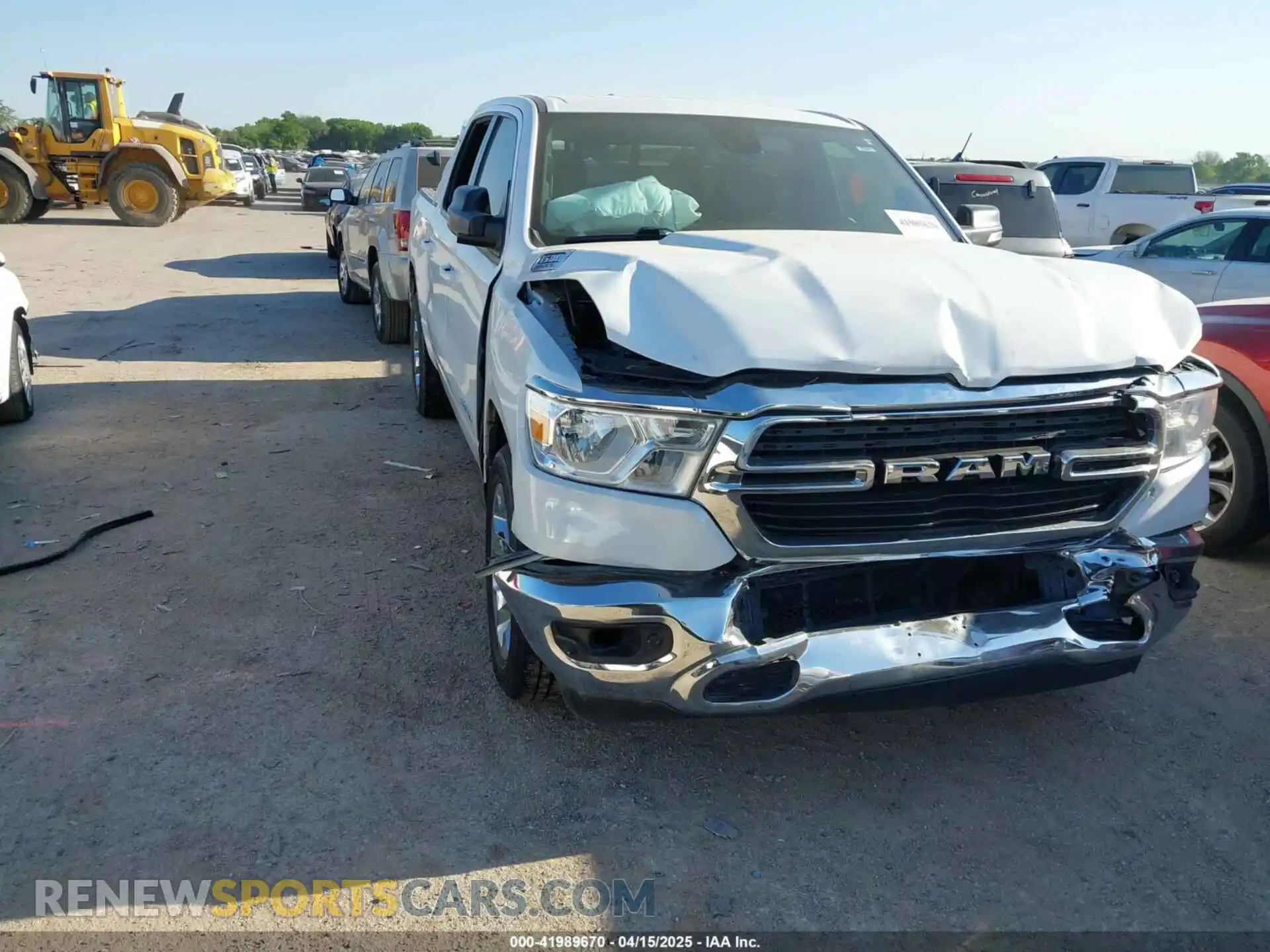 1 Photograph of a damaged car 1C6RREFT9MN610247 RAM 1500 2021