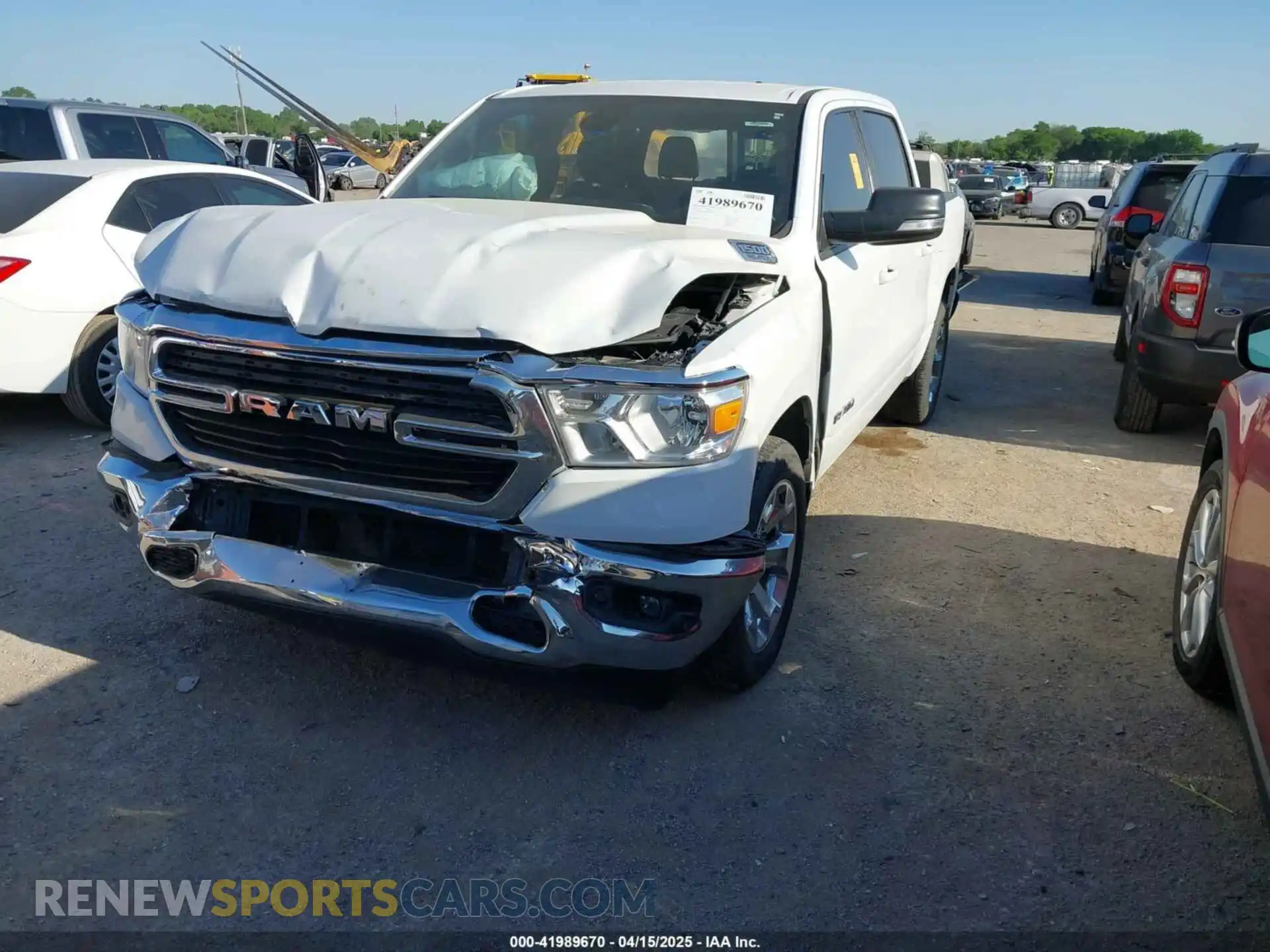2 Photograph of a damaged car 1C6RREFT9MN610247 RAM 1500 2021