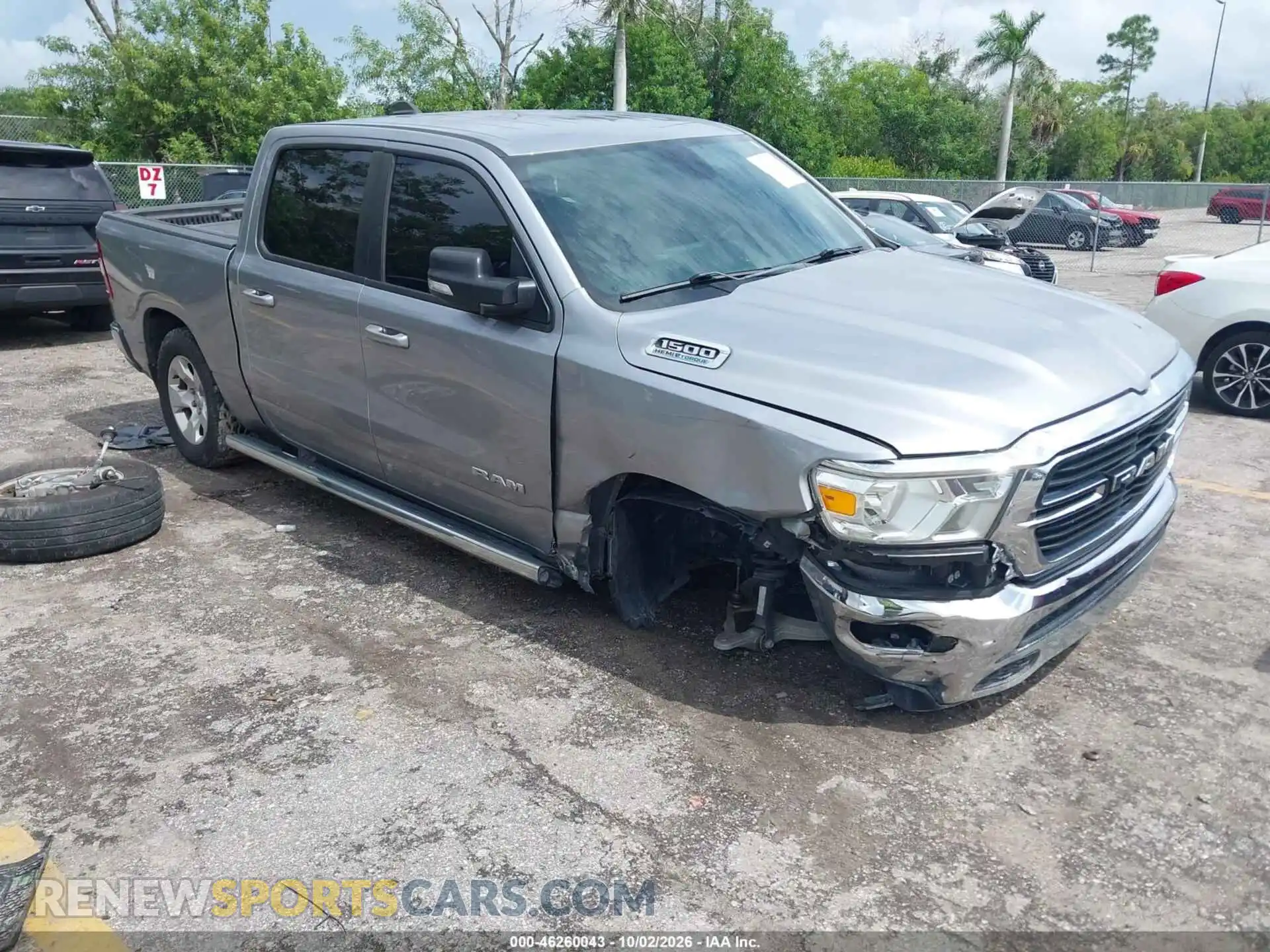 1 Photograph of a damaged car 1C6RREFT9MN647153 RAM 1500 2021