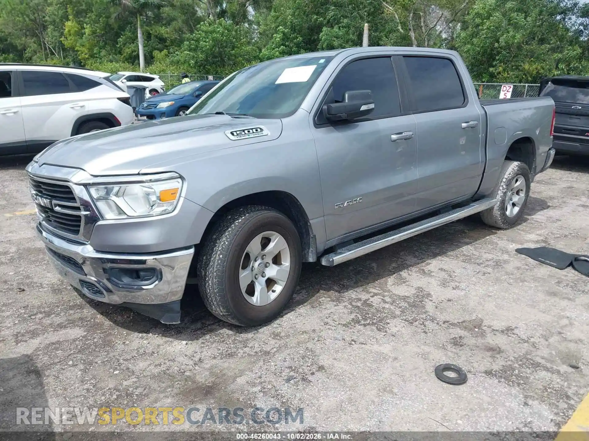 2 Photograph of a damaged car 1C6RREFT9MN647153 RAM 1500 2021