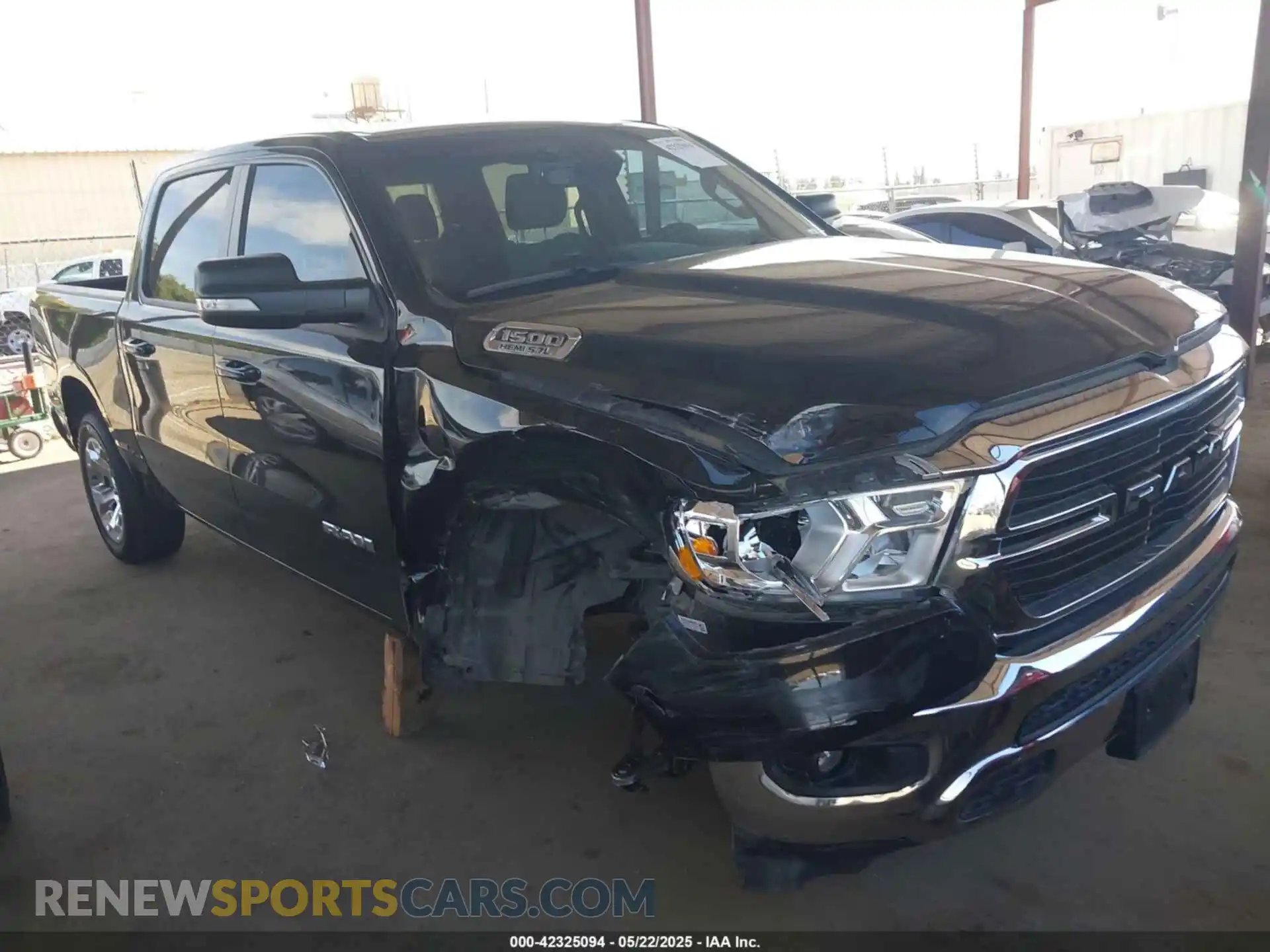 1 Photograph of a damaged car 1C6RREFTXMN501179 RAM 1500 2021