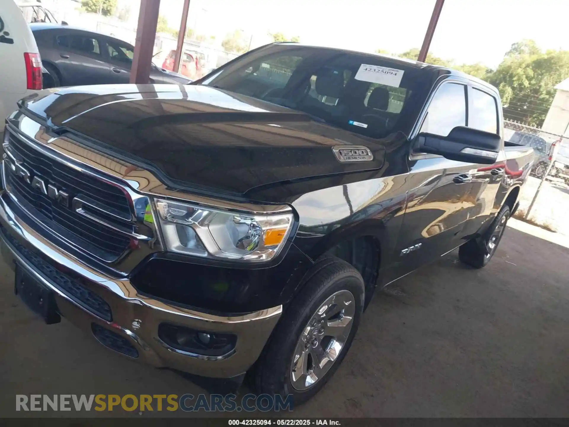 2 Photograph of a damaged car 1C6RREFTXMN501179 RAM 1500 2021