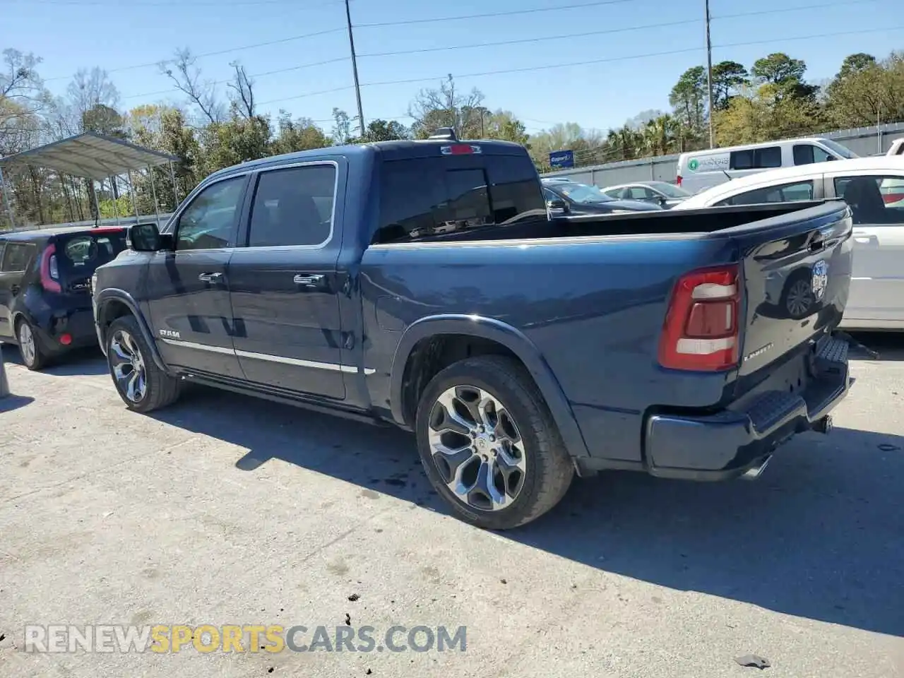 2 Photograph of a damaged car 1C6RREHT1MN575412 RAM 1500 2021