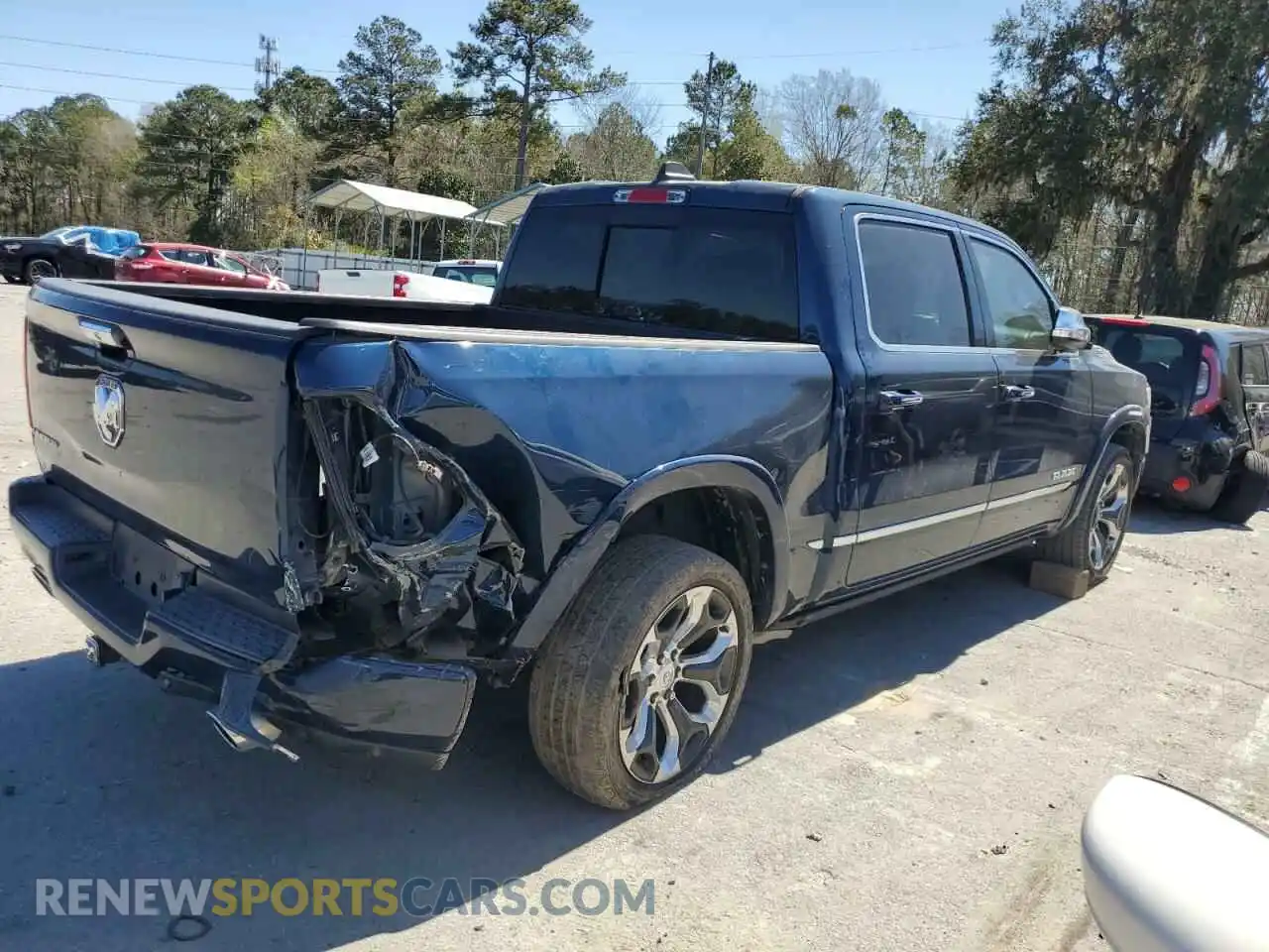 3 Photograph of a damaged car 1C6RREHT1MN575412 RAM 1500 2021