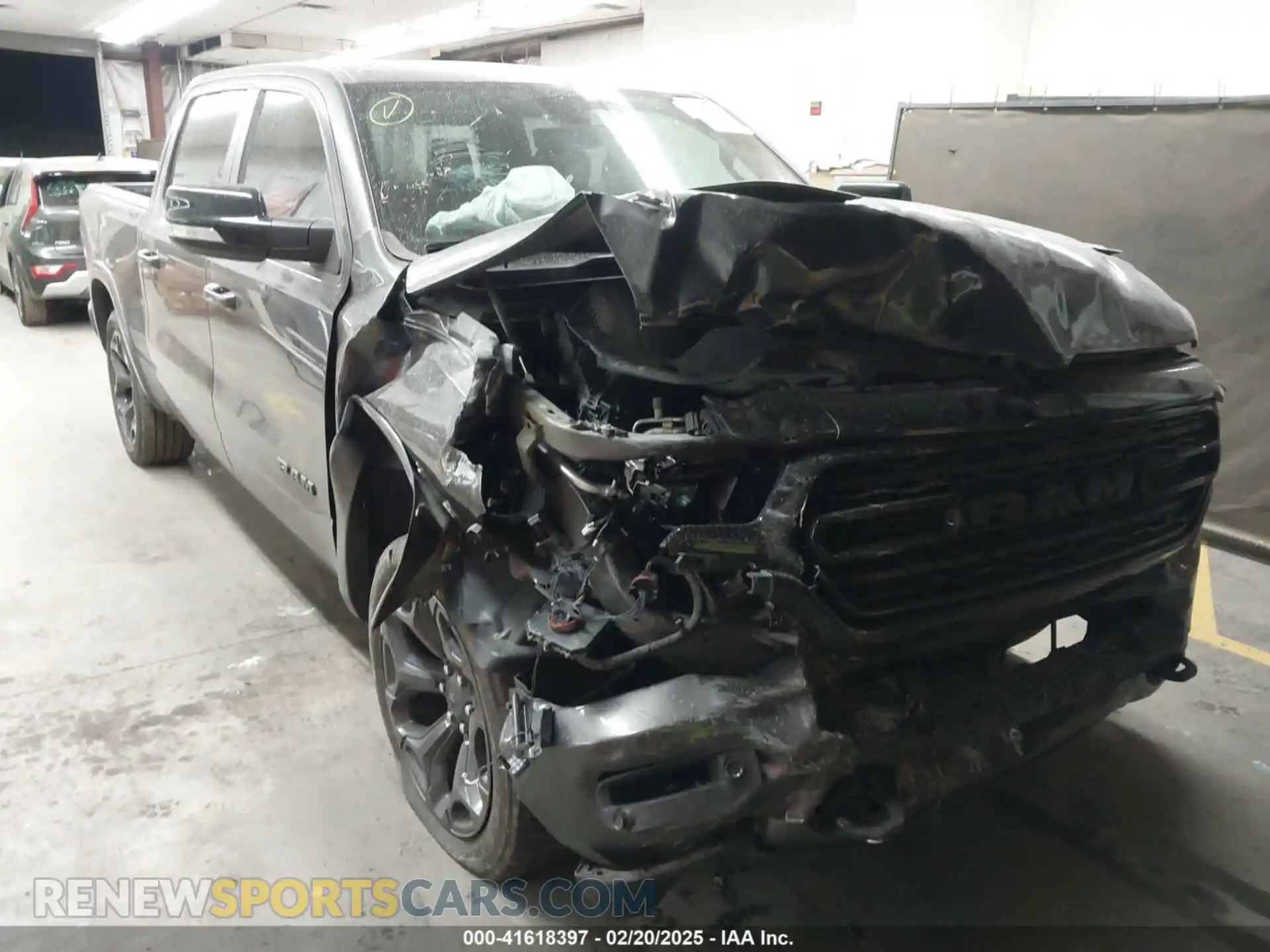 1 Photograph of a damaged car 1C6RREHT7MN593686 RAM 1500 2021