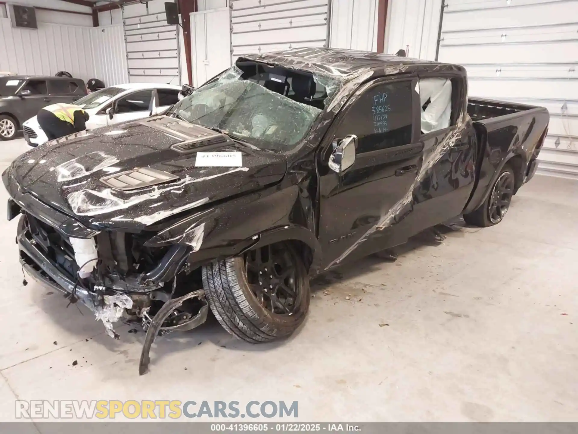 2 Photograph of a damaged car 1C6RREJT2MN710620 RAM 1500 2021