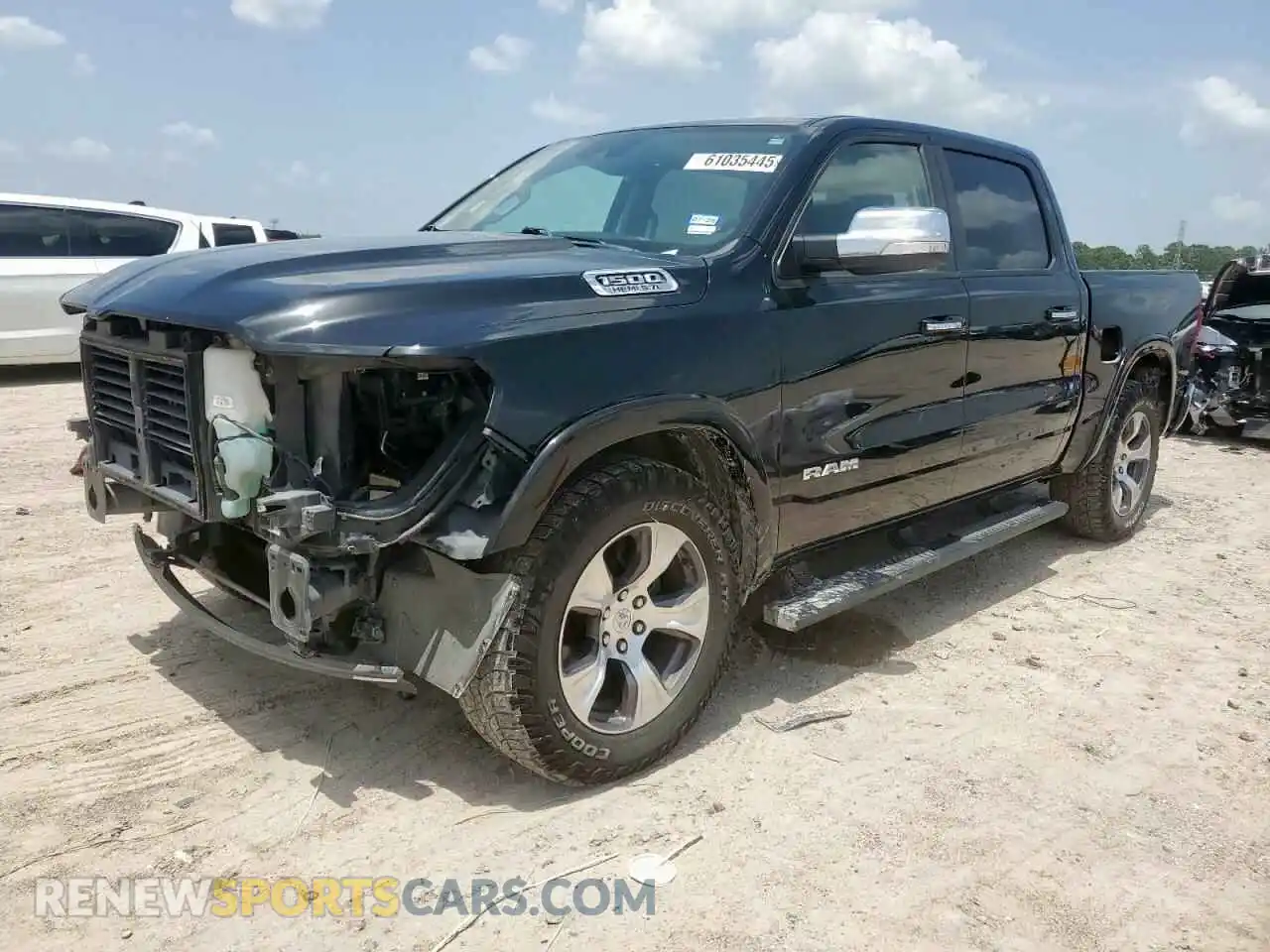 1 Photograph of a damaged car 1C6RREJT4MN711574 RAM 1500 2021