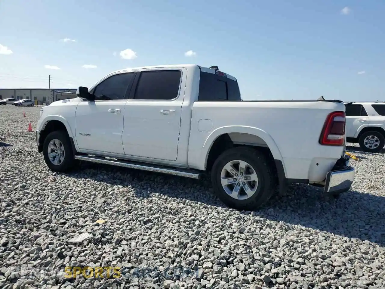 2 Photograph of a damaged car 1C6RREJT4MN820424 RAM 1500 2021