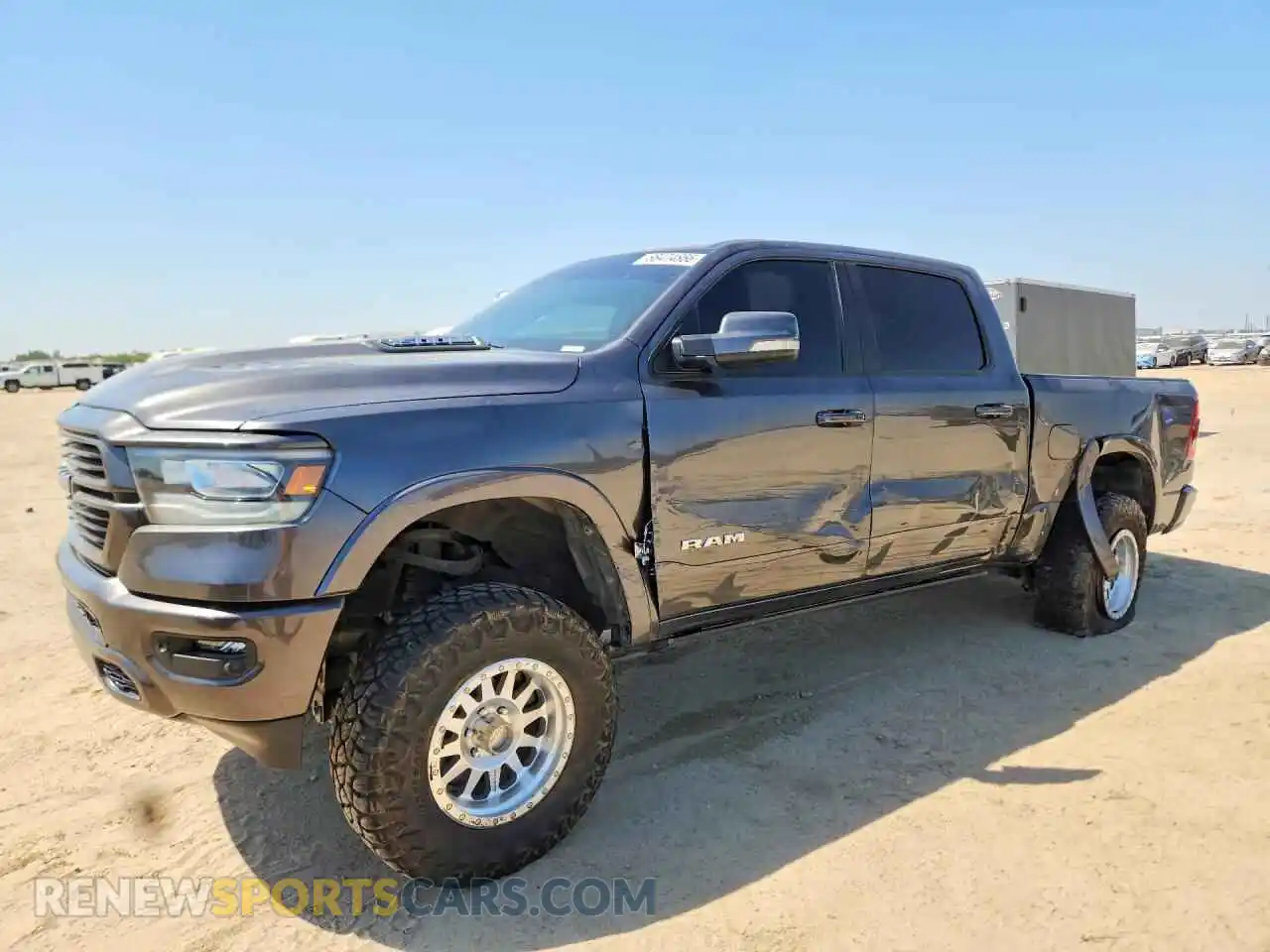 1 Photograph of a damaged car 1C6RREJT7MN712427 RAM 1500 2021