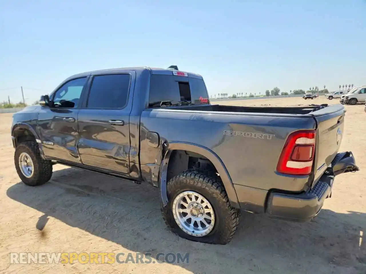 2 Photograph of a damaged car 1C6RREJT7MN712427 RAM 1500 2021