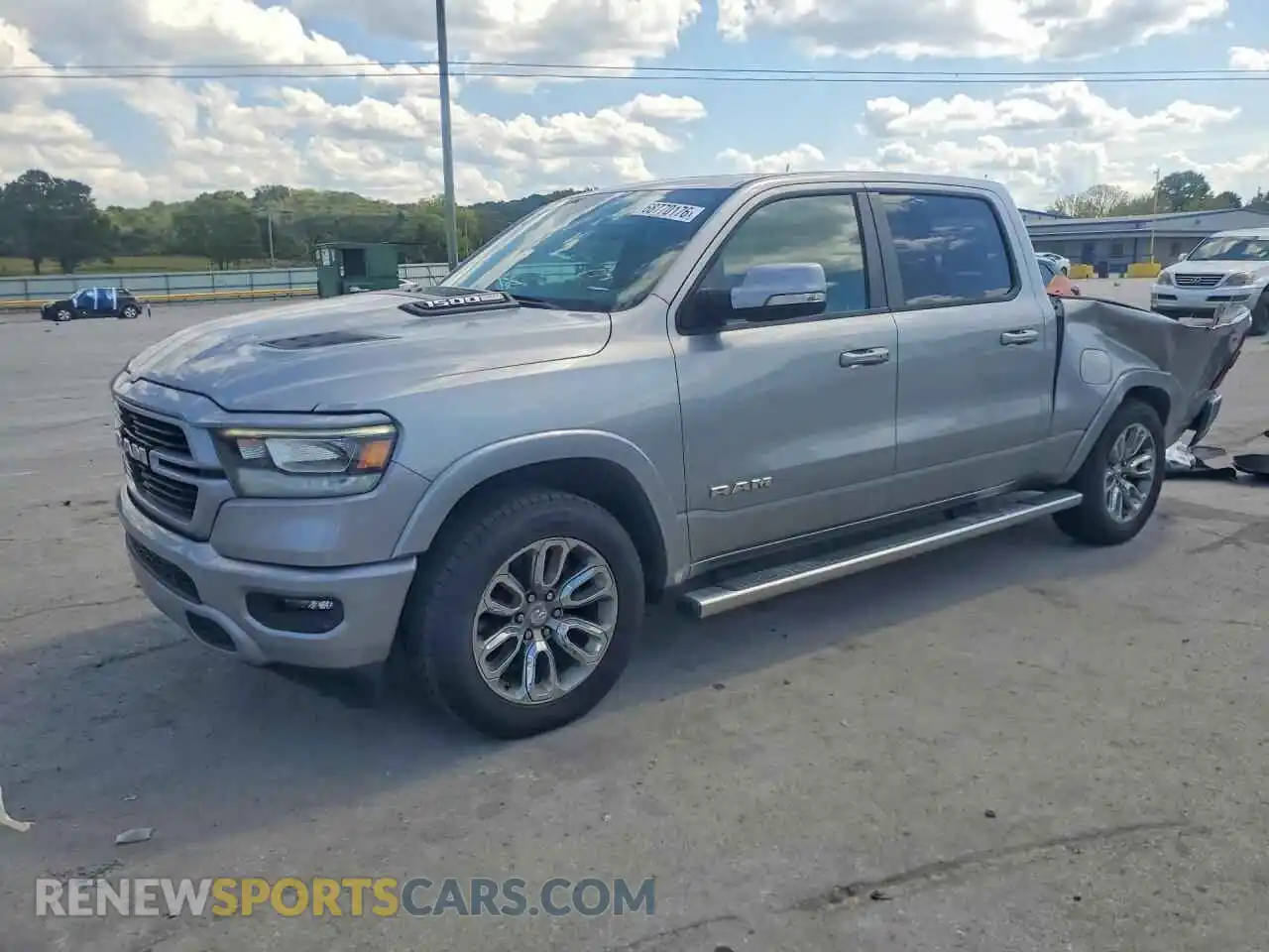 1 Photograph of a damaged car 1C6RREJT8MN569133 RAM 1500 2021