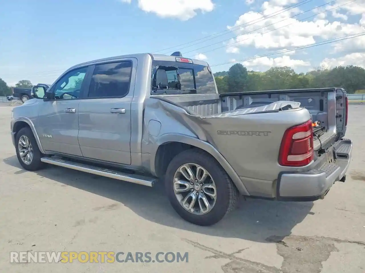 2 Photograph of a damaged car 1C6RREJT8MN569133 RAM 1500 2021
