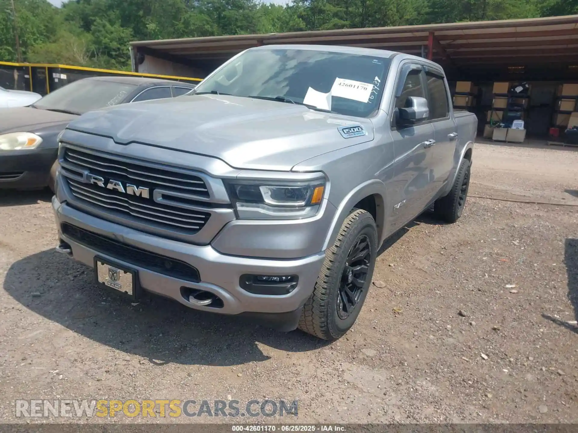 2 Photograph of a damaged car 1C6RREJT8MN767937 RAM 1500 2021