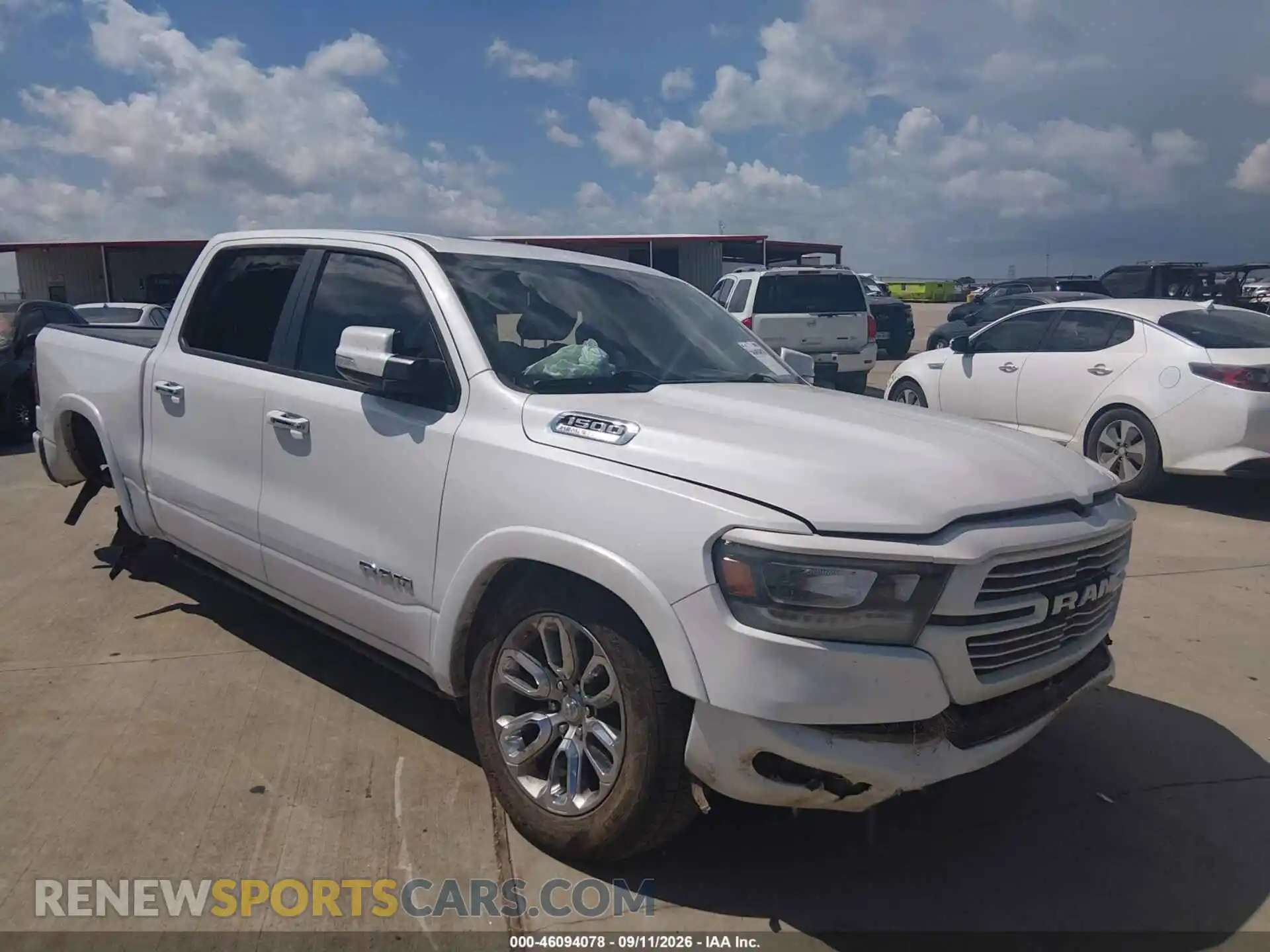 1 Photograph of a damaged car 1C6RREJT8MN769106 RAM 1500 2021