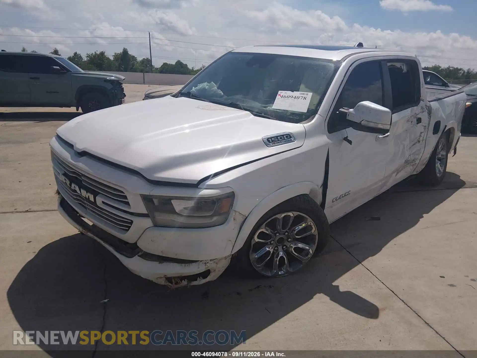 2 Photograph of a damaged car 1C6RREJT8MN769106 RAM 1500 2021