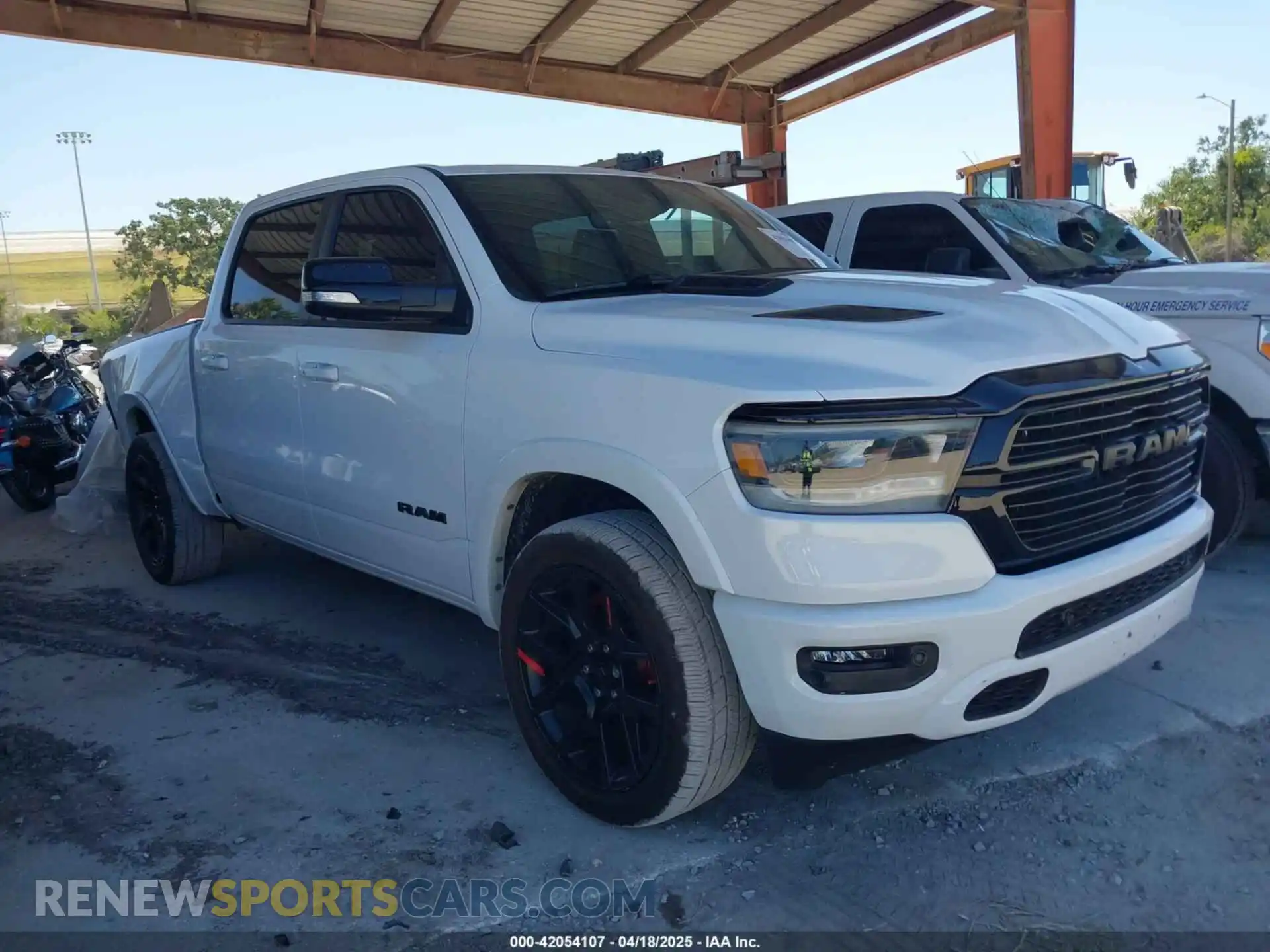 1 Photograph of a damaged car 1C6RREJTXMN794380 RAM 1500 2021