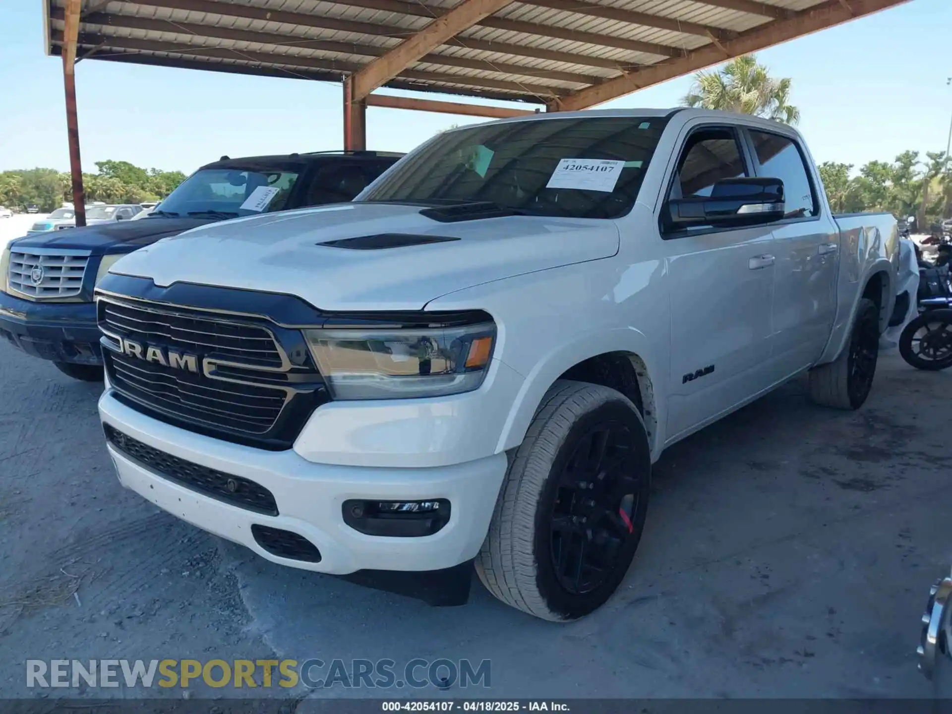 2 Photograph of a damaged car 1C6RREJTXMN794380 RAM 1500 2021