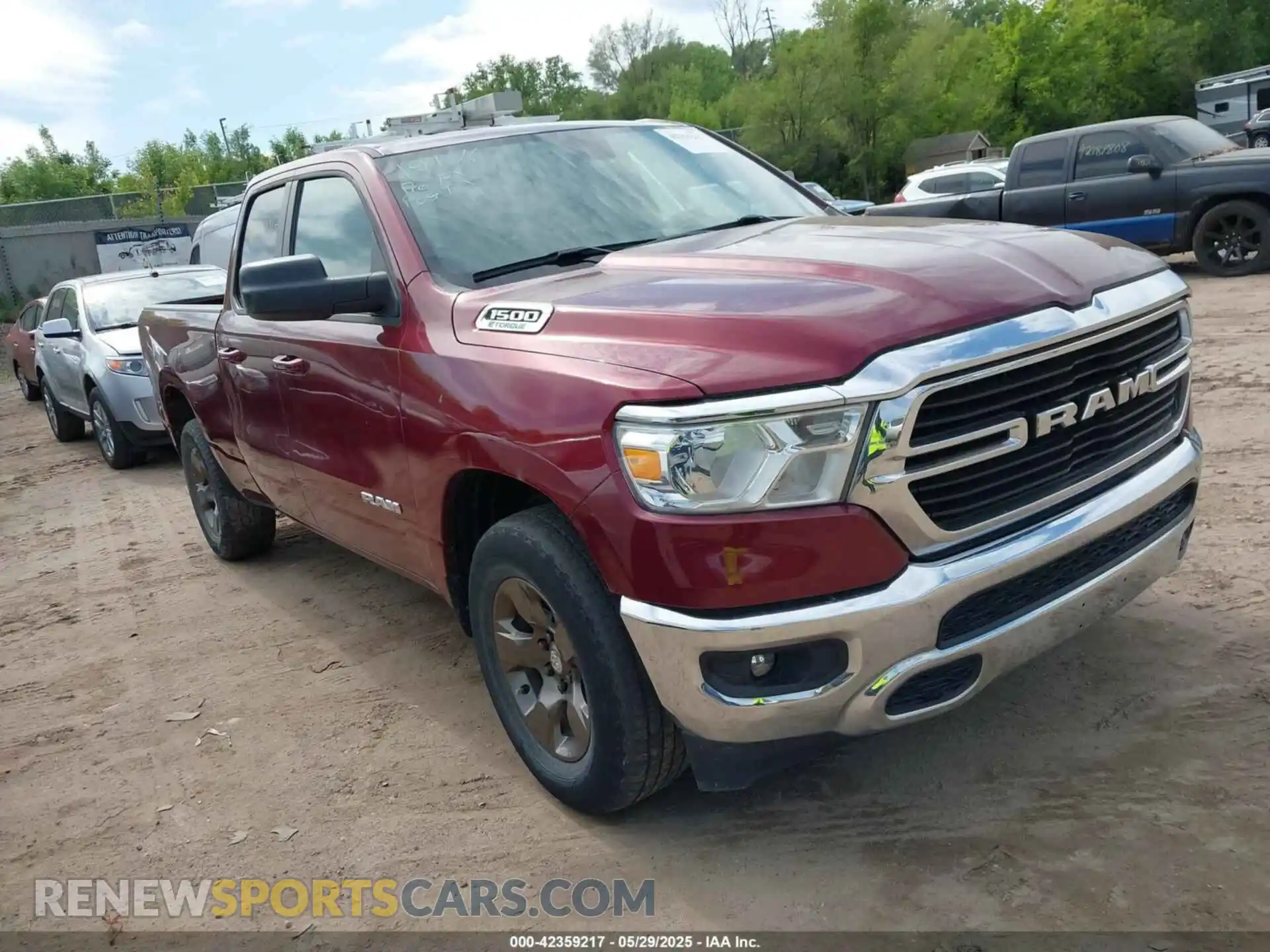 1 Photograph of a damaged car 1C6RRFBG0MN697843 RAM 1500 2021