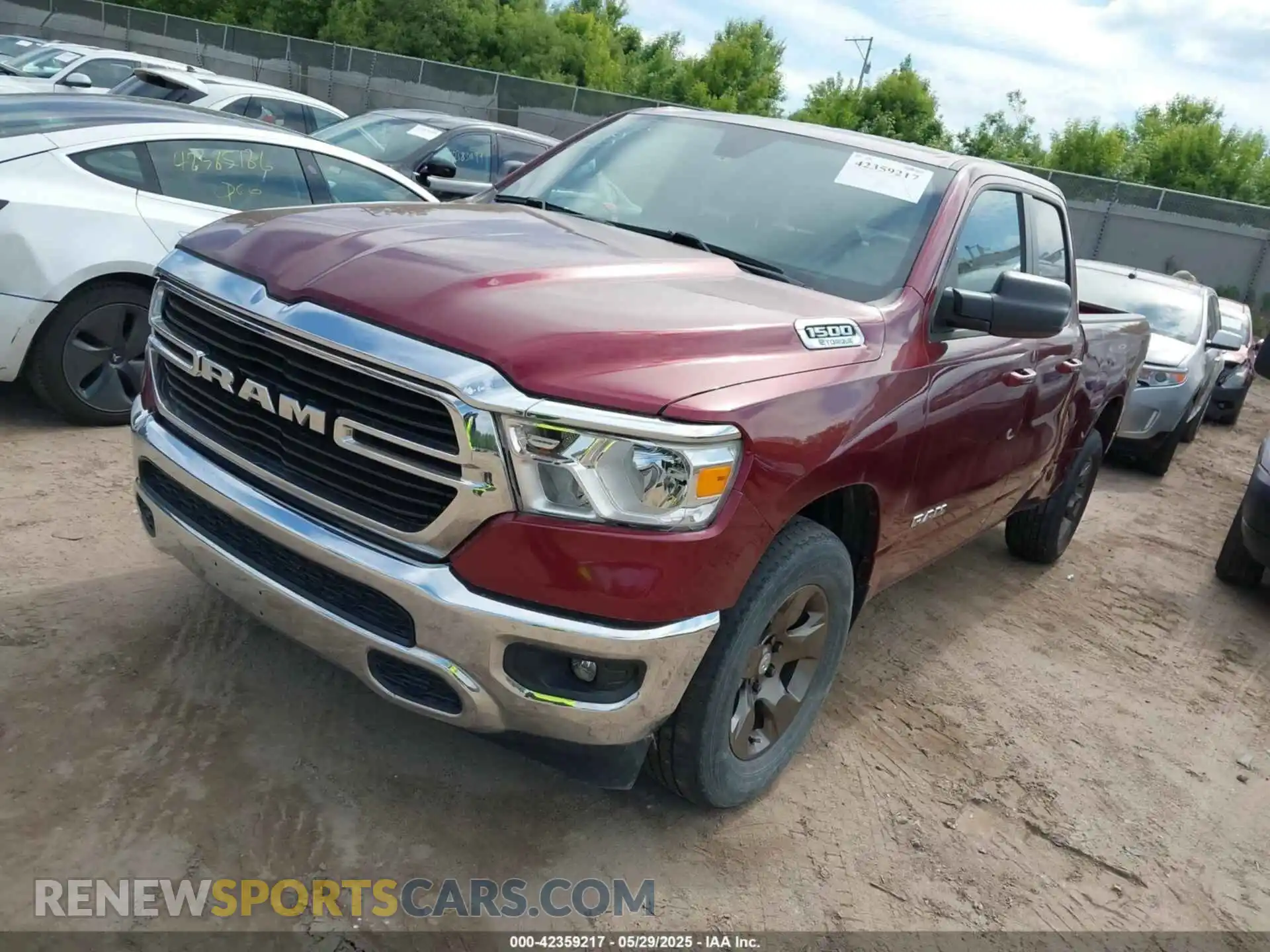 2 Photograph of a damaged car 1C6RRFBG0MN697843 RAM 1500 2021
