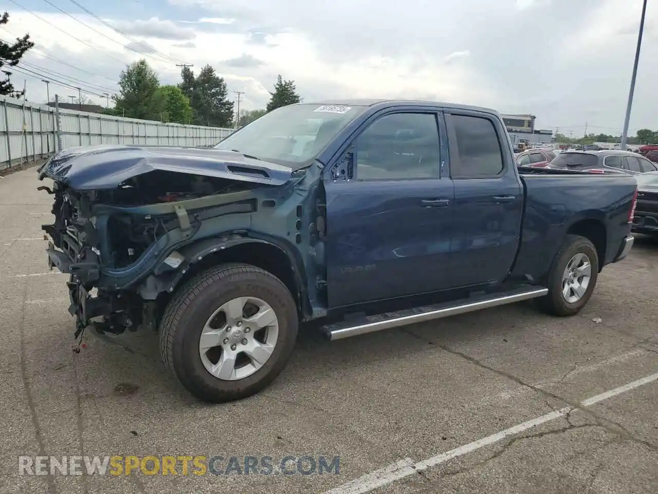 1 Photograph of a damaged car 1C6RRFBGXMN607744 RAM 1500 2021