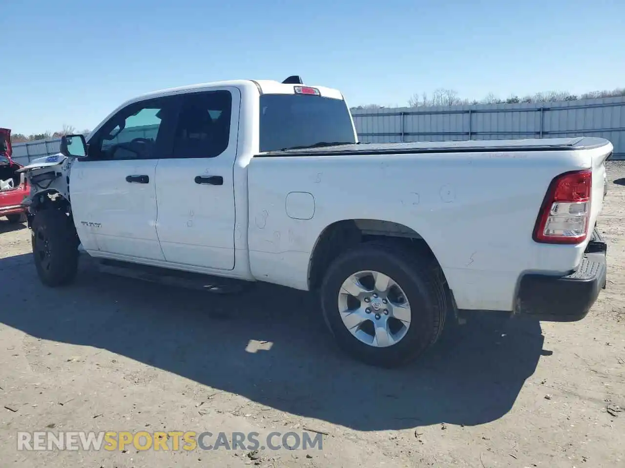 2 Photograph of a damaged car 1C6RRFCG1MN737877 RAM 1500 2021