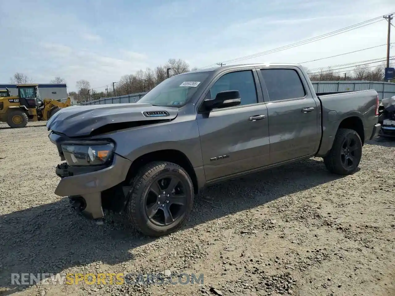 1 Photograph of a damaged car 1C6RRFFG0MN578989 RAM 1500 2021