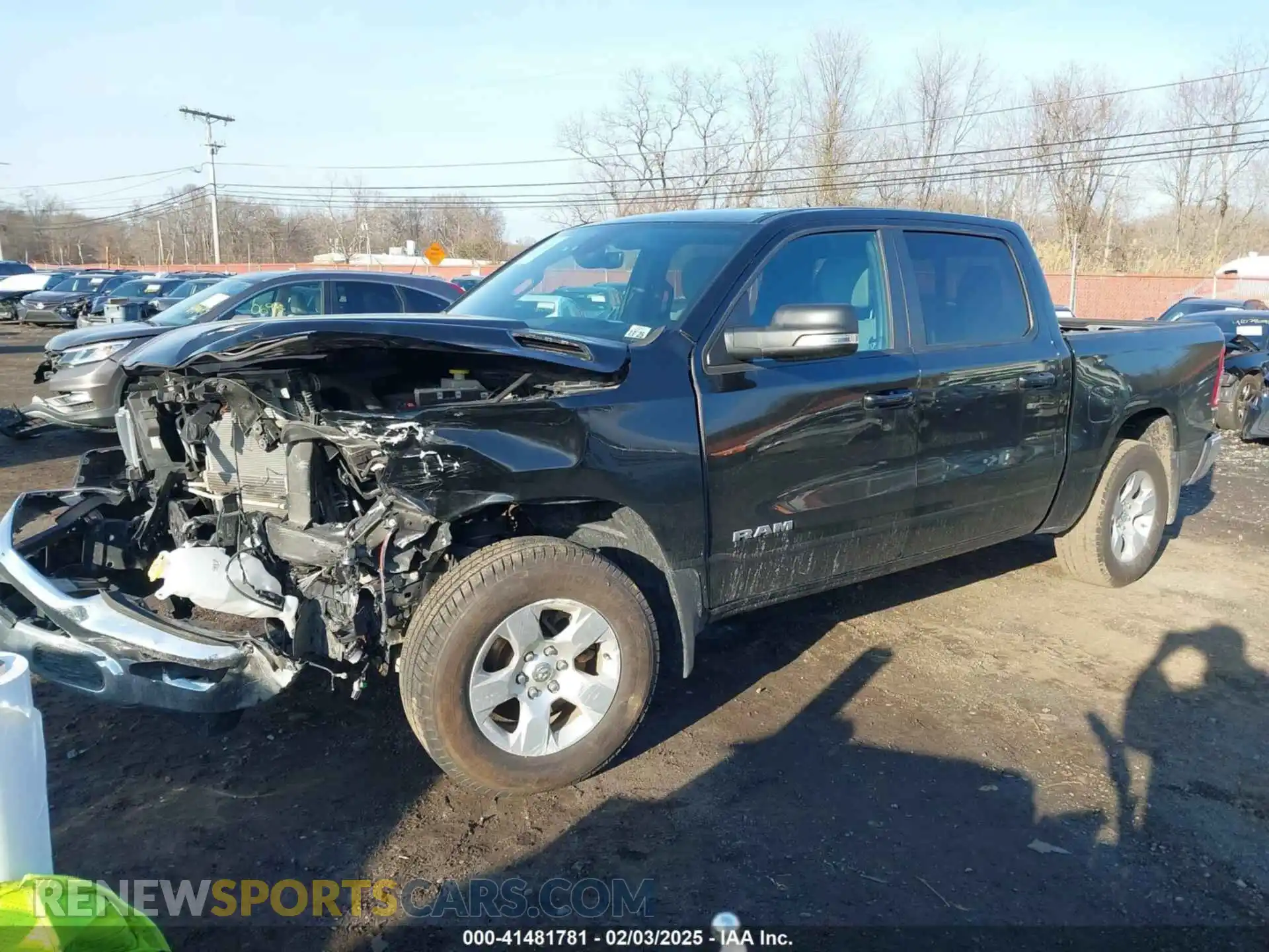 2 Photograph of a damaged car 1C6RRFFG2MN557285 RAM 1500 2021