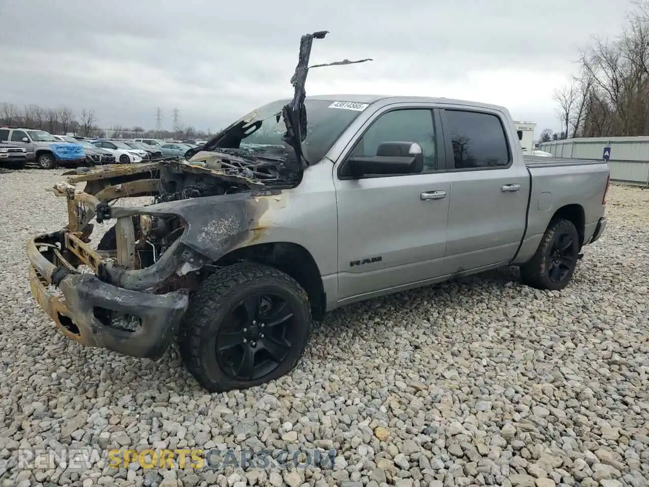 1 Photograph of a damaged car 1C6RRFFG2MN813795 RAM 1500 2021