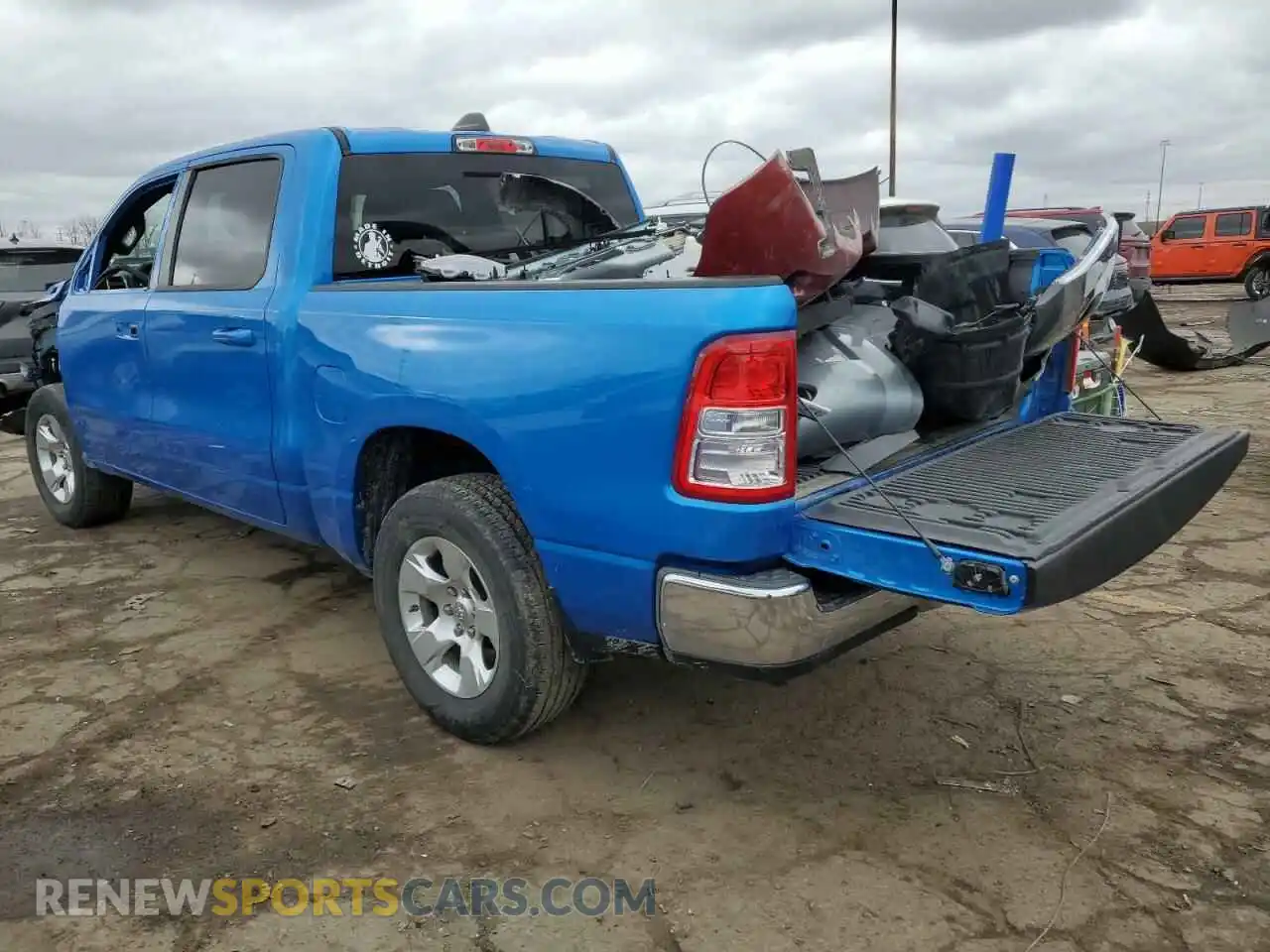 2 Photograph of a damaged car 1C6RRFFG3MN645360 RAM 1500 2021