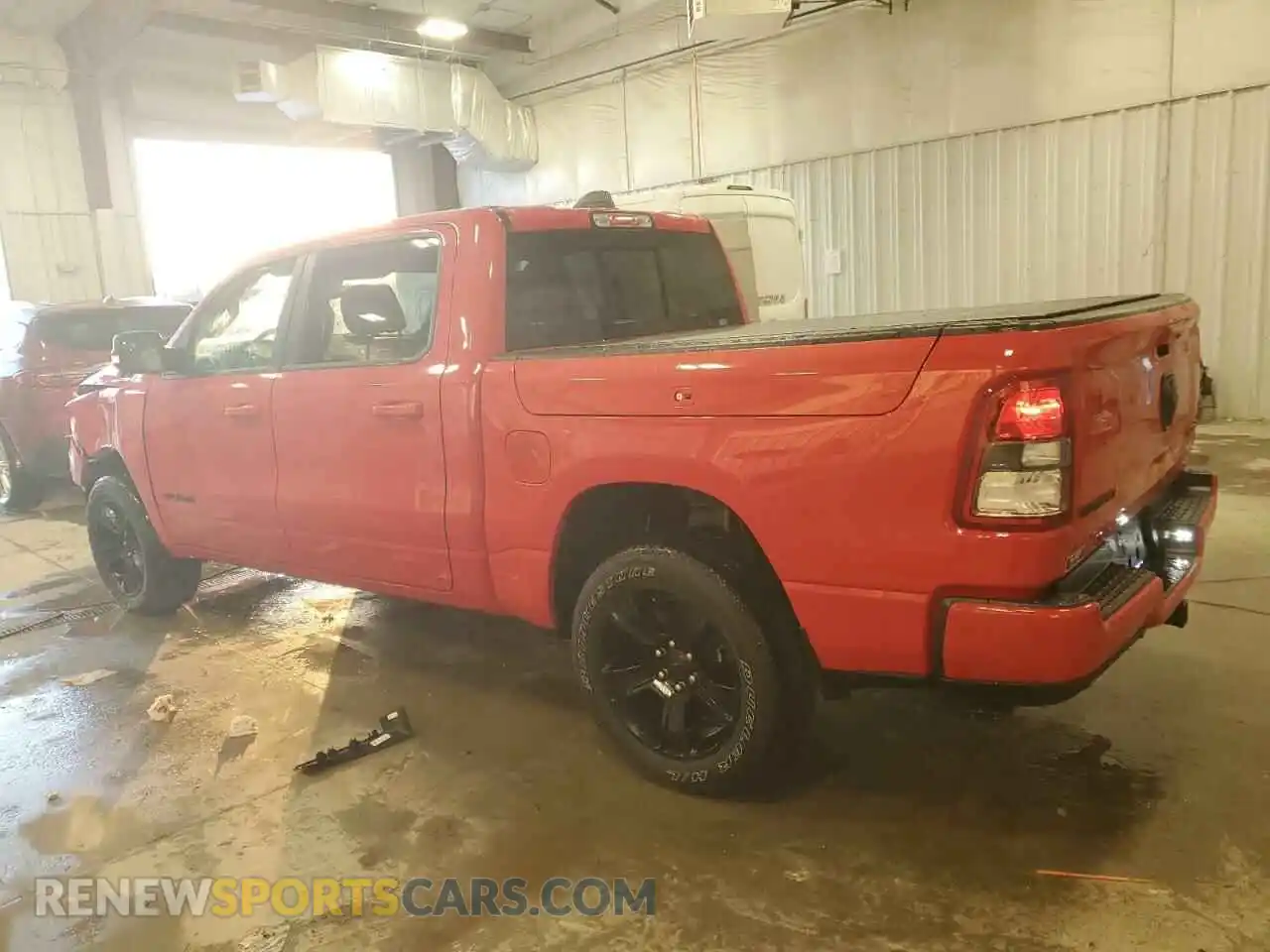 2 Photograph of a damaged car 1C6RRFFG4MN521257 RAM 1500 2021