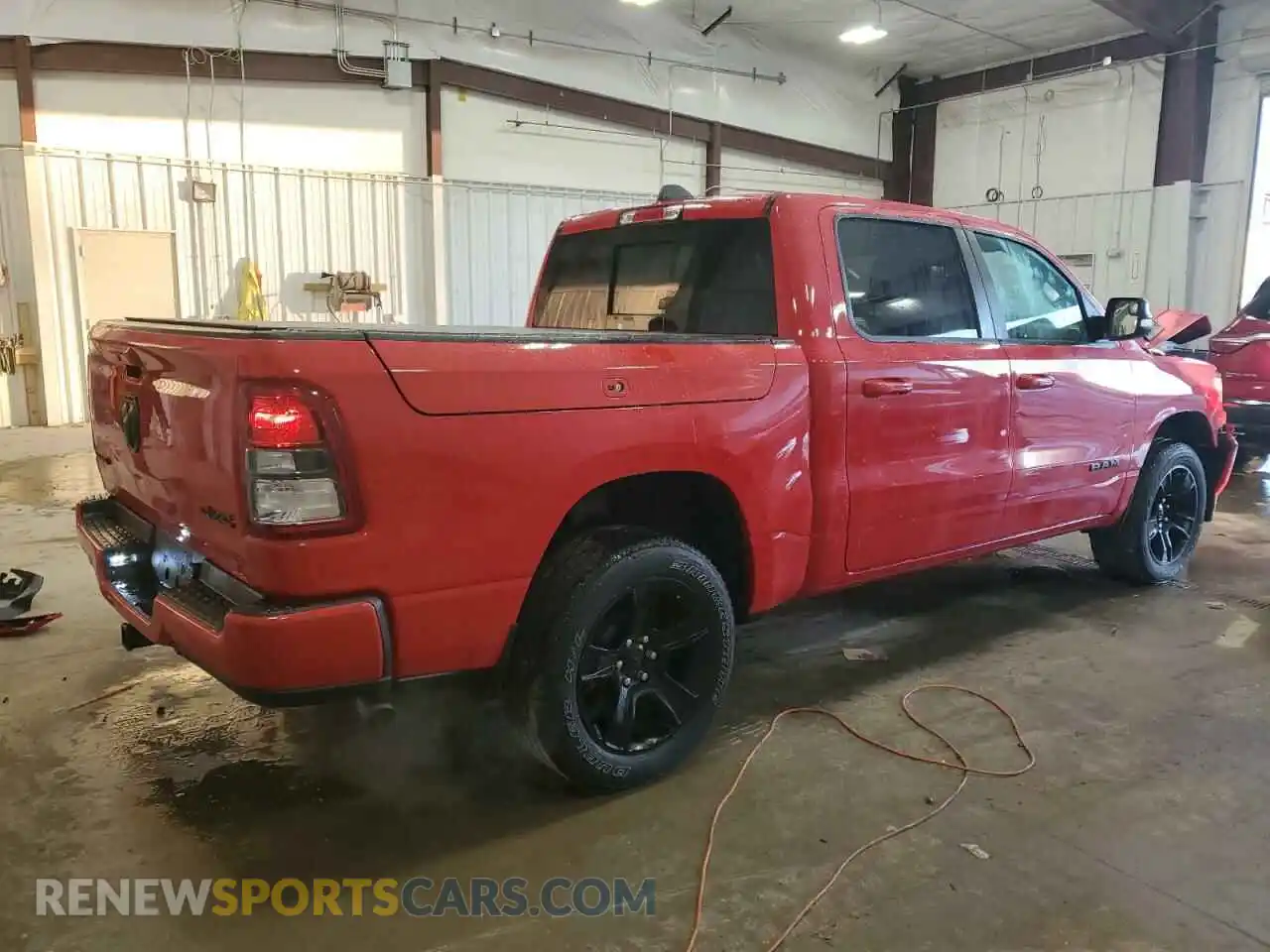 3 Photograph of a damaged car 1C6RRFFG4MN521257 RAM 1500 2021