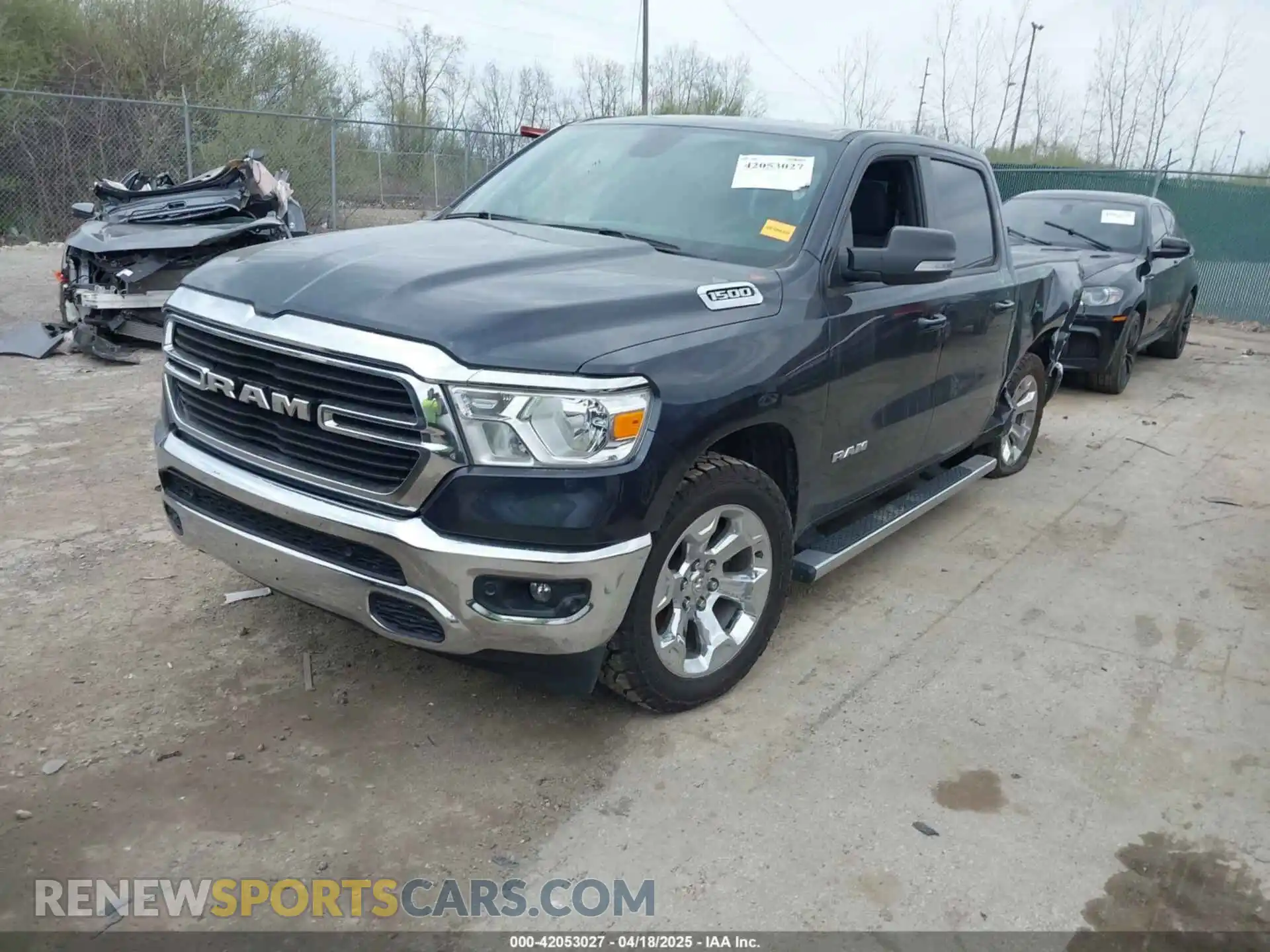 2 Photograph of a damaged car 1C6RRFFG7MN521057 RAM 1500 2021