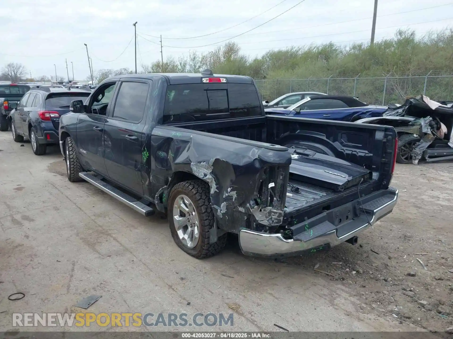 3 Photograph of a damaged car 1C6RRFFG7MN521057 RAM 1500 2021