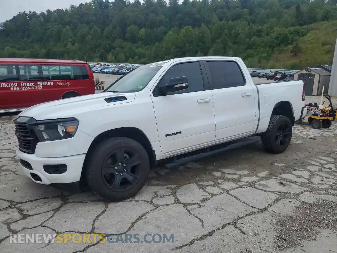 1 Photograph of a damaged car 1C6RRFFG8MN620034 RAM 1500 2021