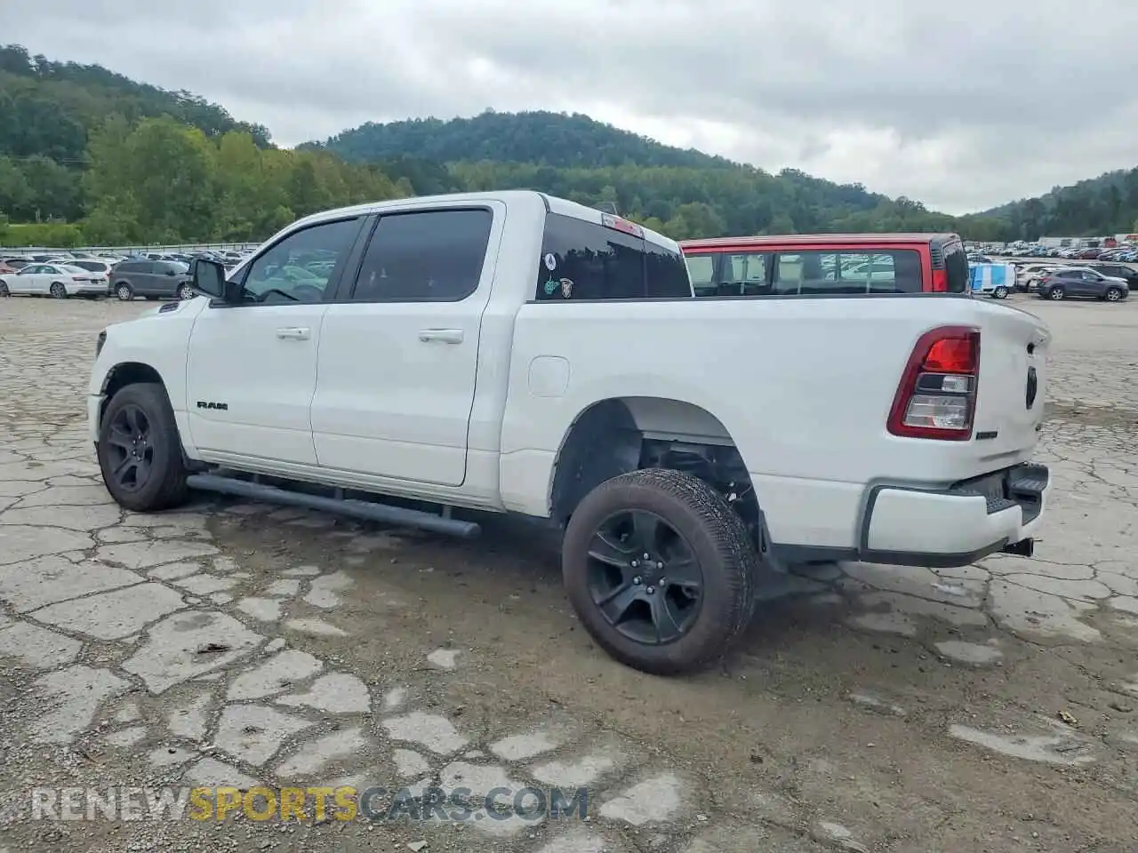 2 Photograph of a damaged car 1C6RRFFG8MN620034 RAM 1500 2021