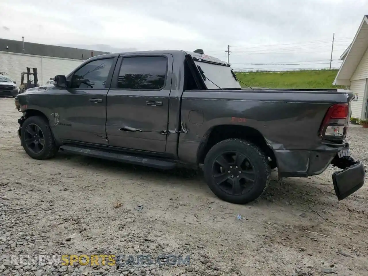 2 Photograph of a damaged car 1C6RRFFGXMN590468 RAM 1500 2021