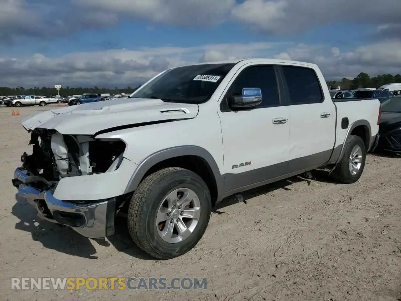 1 Photograph of a damaged car 1C6RRFJG8MN706628 RAM 1500 2021