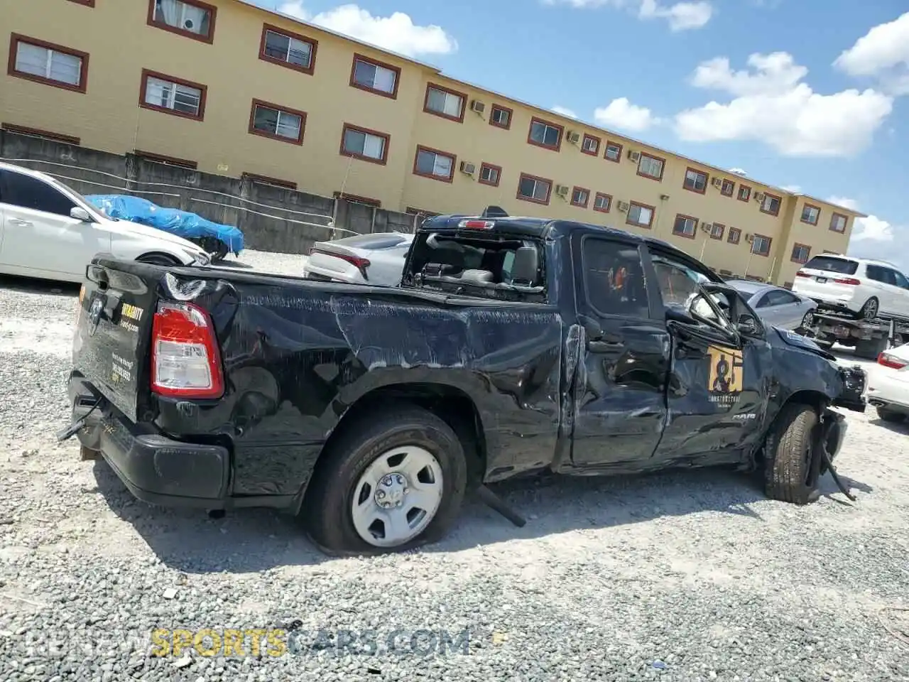 3 Photograph of a damaged car 1C6SRECG5MN661379 RAM 1500 2021