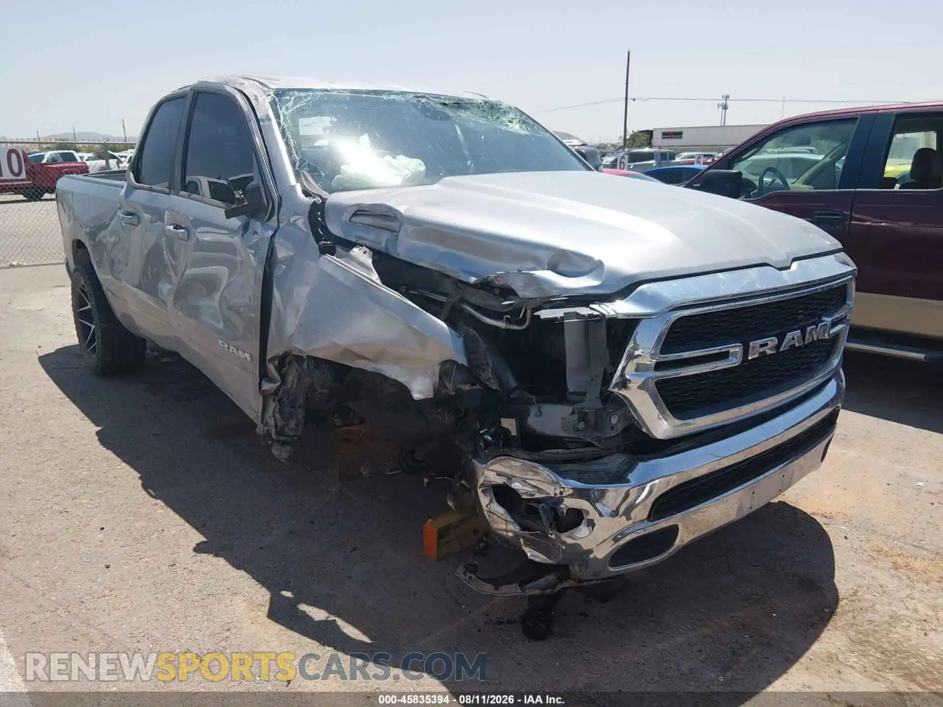 1 Photograph of a damaged car 1C6SRFBM0MN833296 RAM 1500 2021
