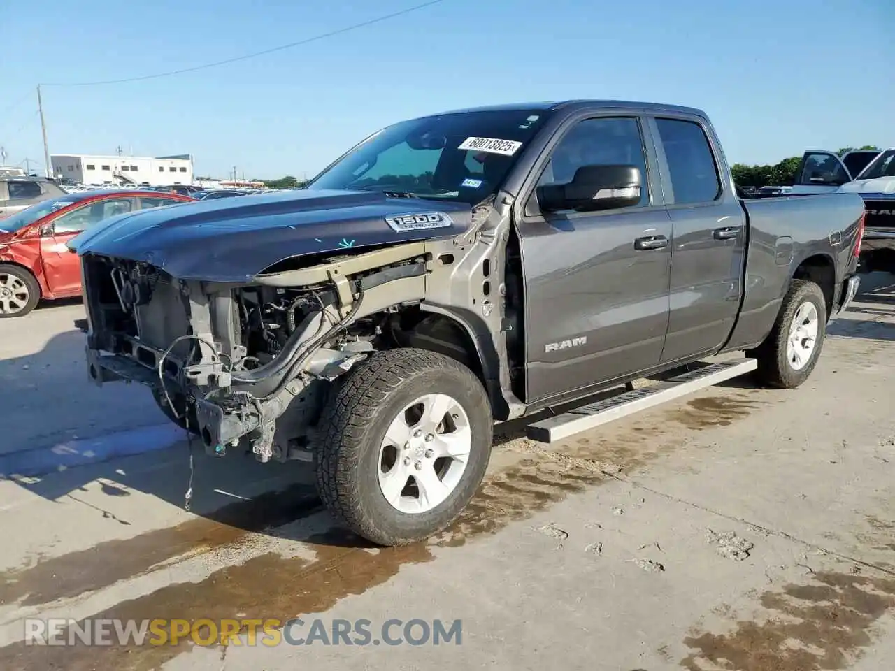 1 Photograph of a damaged car 1C6SRFBT0MN714932 RAM 1500 2021