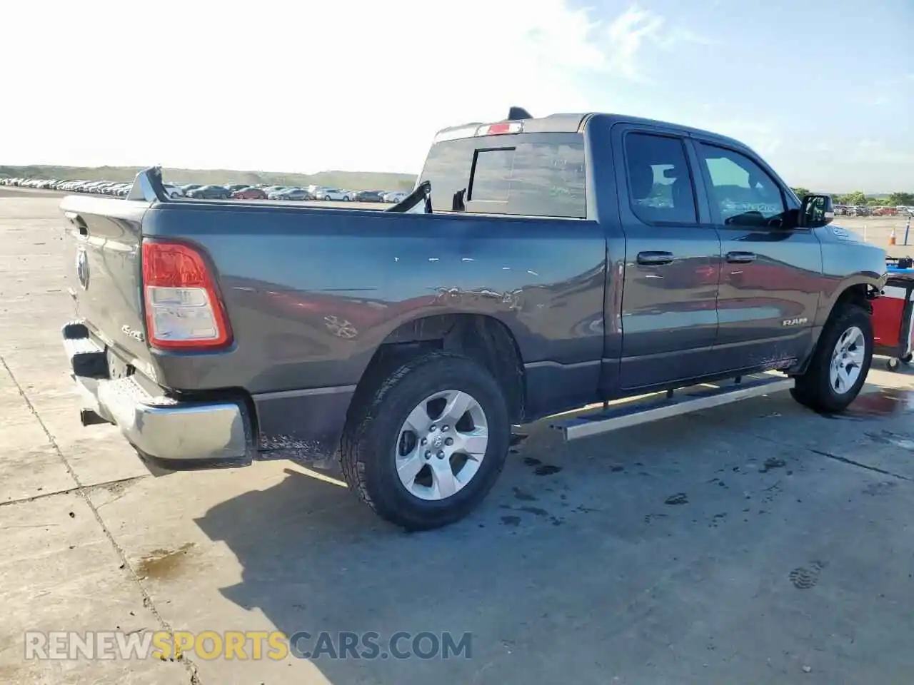 3 Photograph of a damaged car 1C6SRFBT0MN714932 RAM 1500 2021